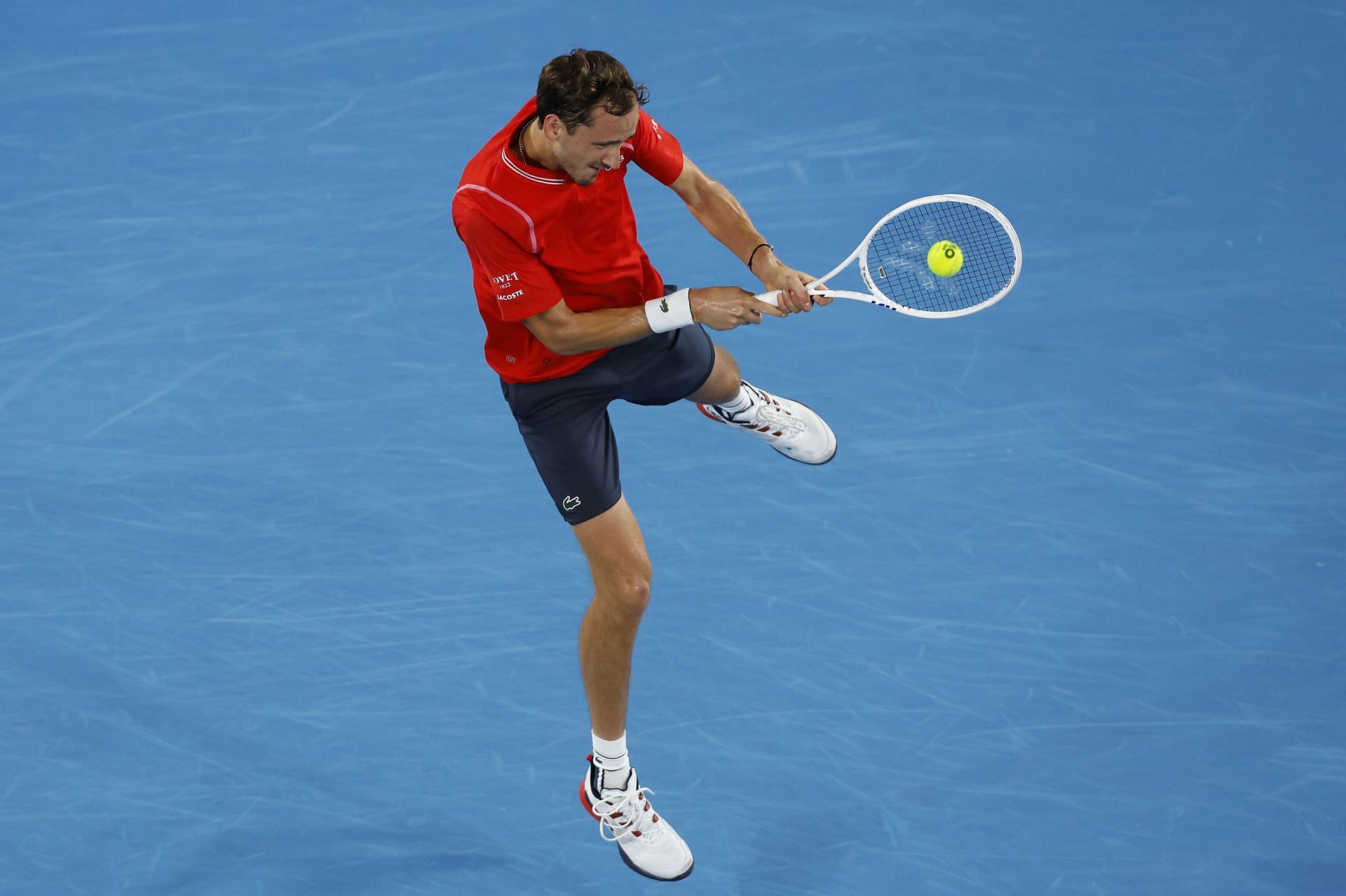 Medvedev strikes the ball at the 2023 Australian Open