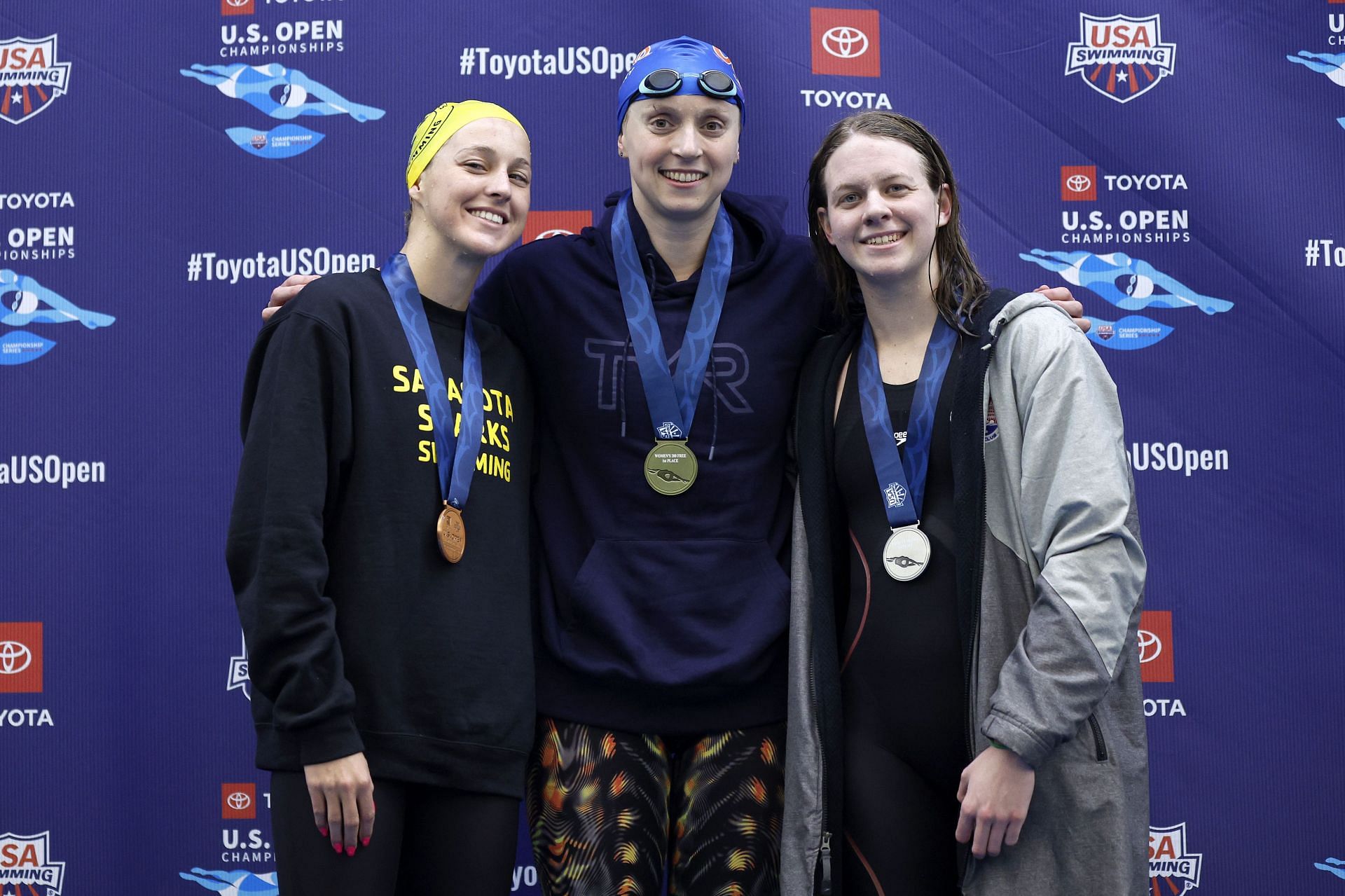 Gold medalist Katie Ledecky, silver medalist Erin Gemmell, and bronze medalist Addison Sauickie pose with their medals after competing in the Women&#039;s 200m Freestyle Final during the Toyota U.S. Open Championships at Greensboro Aquatic Center on December 02, 2022 in Greensboro, North Carolina. (Photo by Jared C. Tilton/Getty Images)