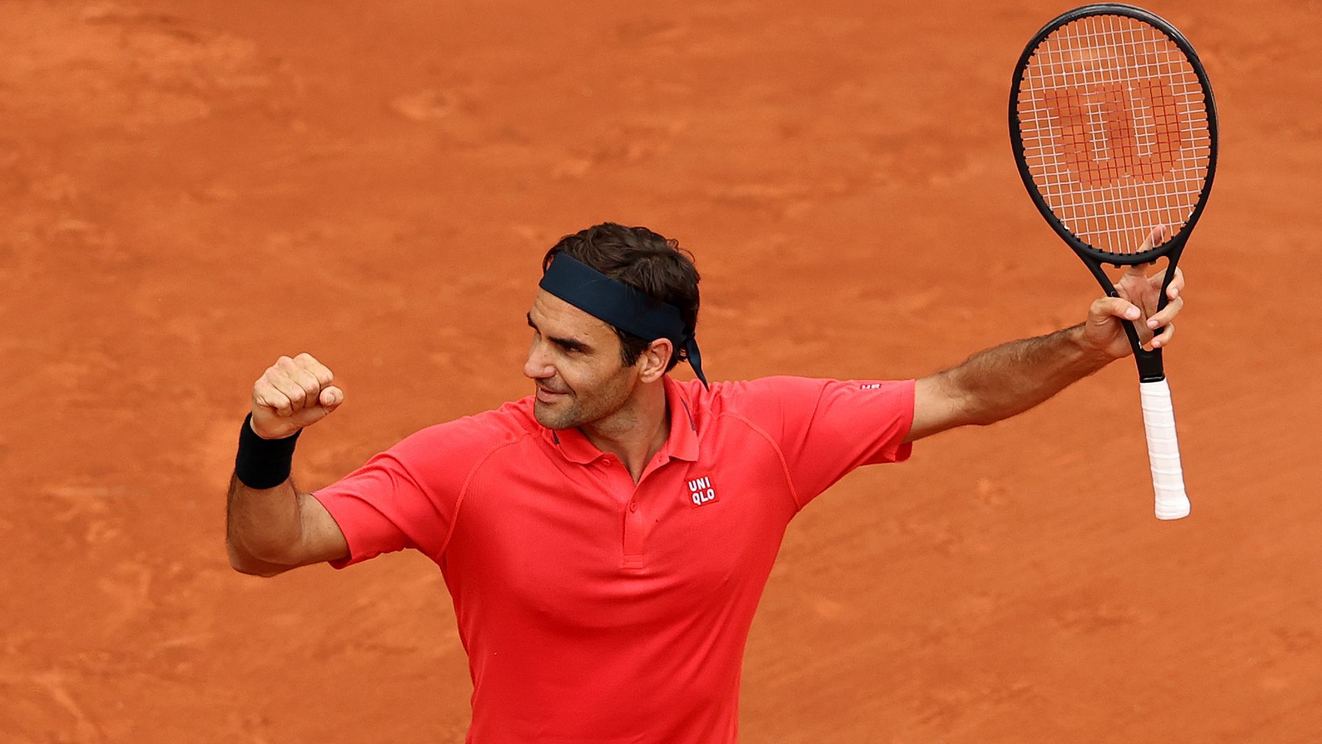 Roger Federer with a Wilson racquet.