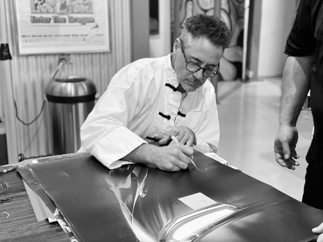 How tall is Robert Downey Jr?