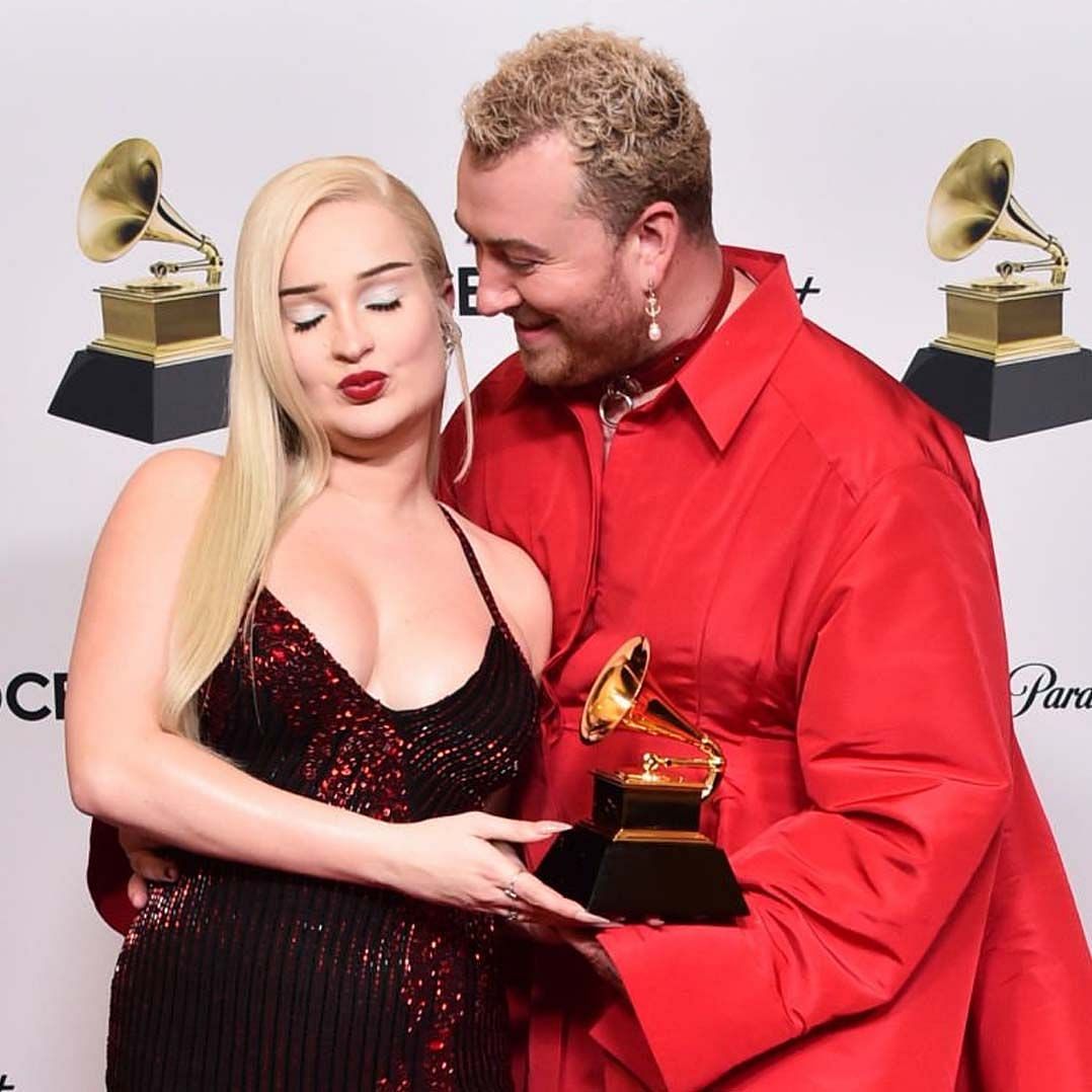 Sam Smith and Petras with their award (Image via Getty Images)