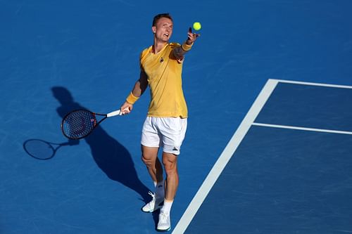 Lehecka serves at the Qatar ExxonMobil Open.