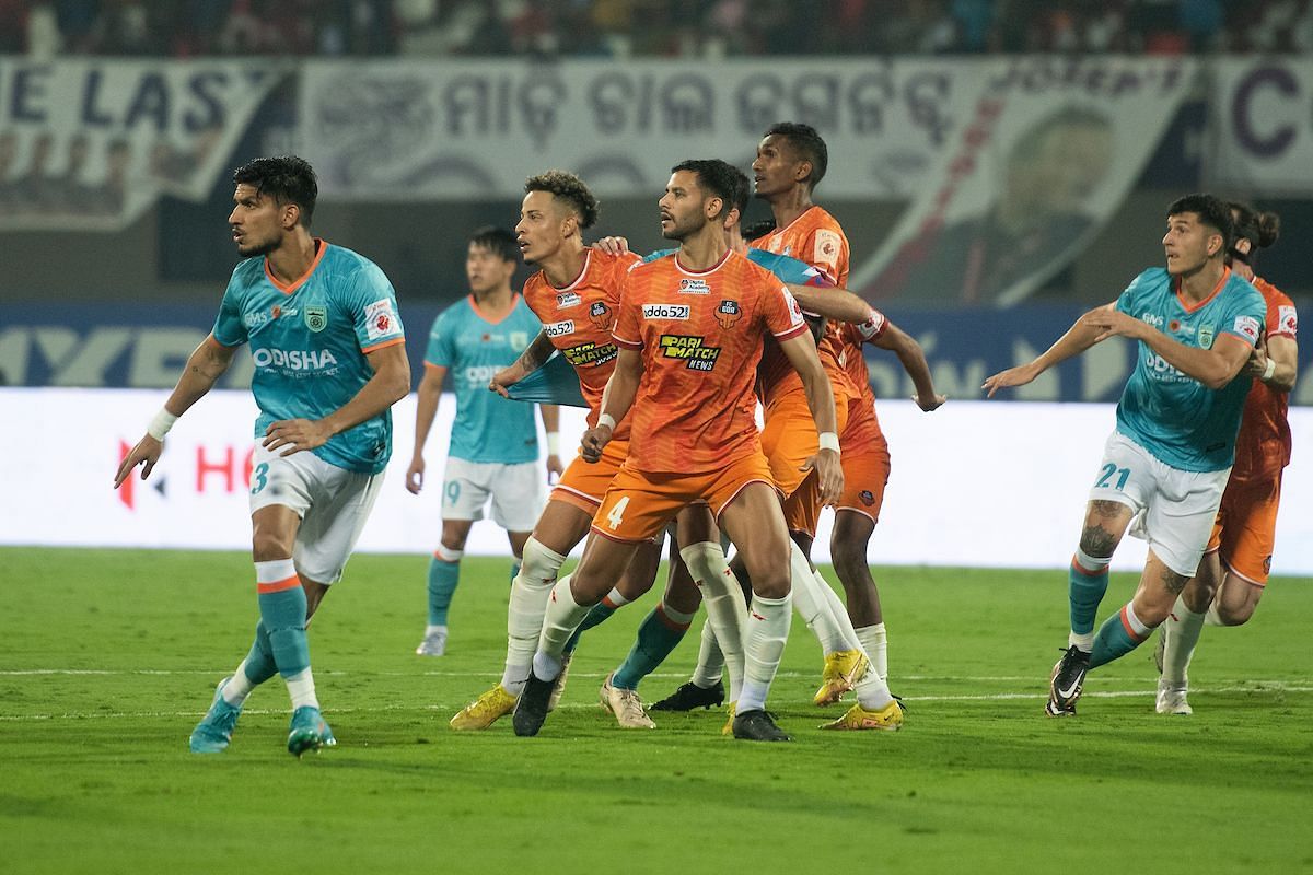 FCG and OFC players in action at the Kalinga Stadium.