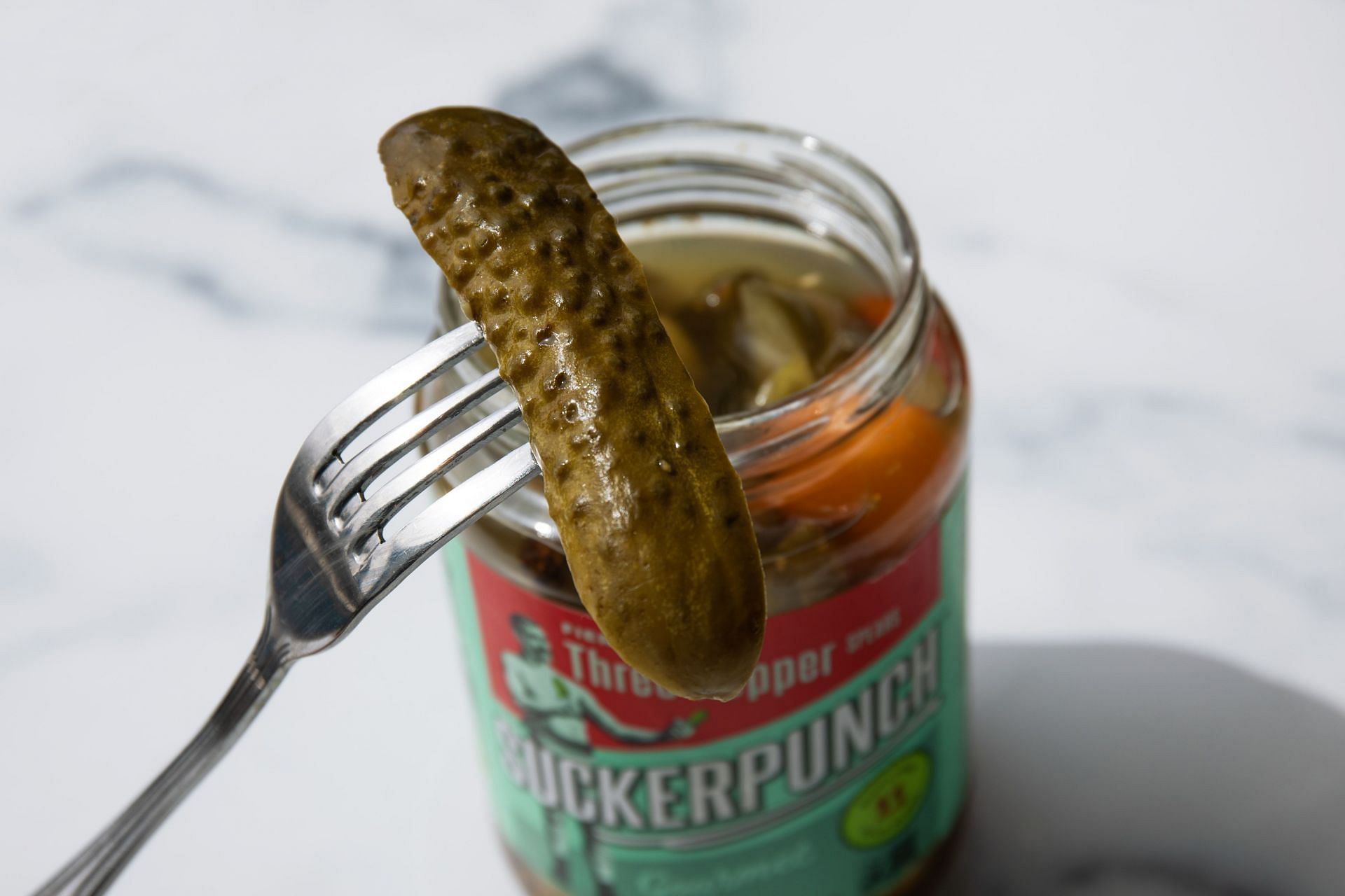 Pickles as well as pickle juice can cure hangover. (Image via Unsplash/ Suckerpunch Gourmet)