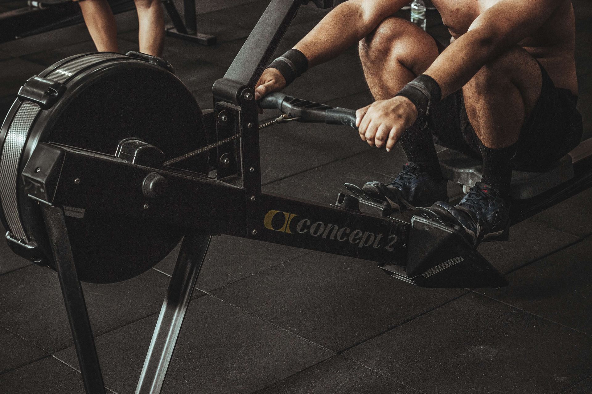 Rowing machines offer one of the best all-round workouts that you can do without stressing your joints (Image via Unsplash @Victor Freitas)