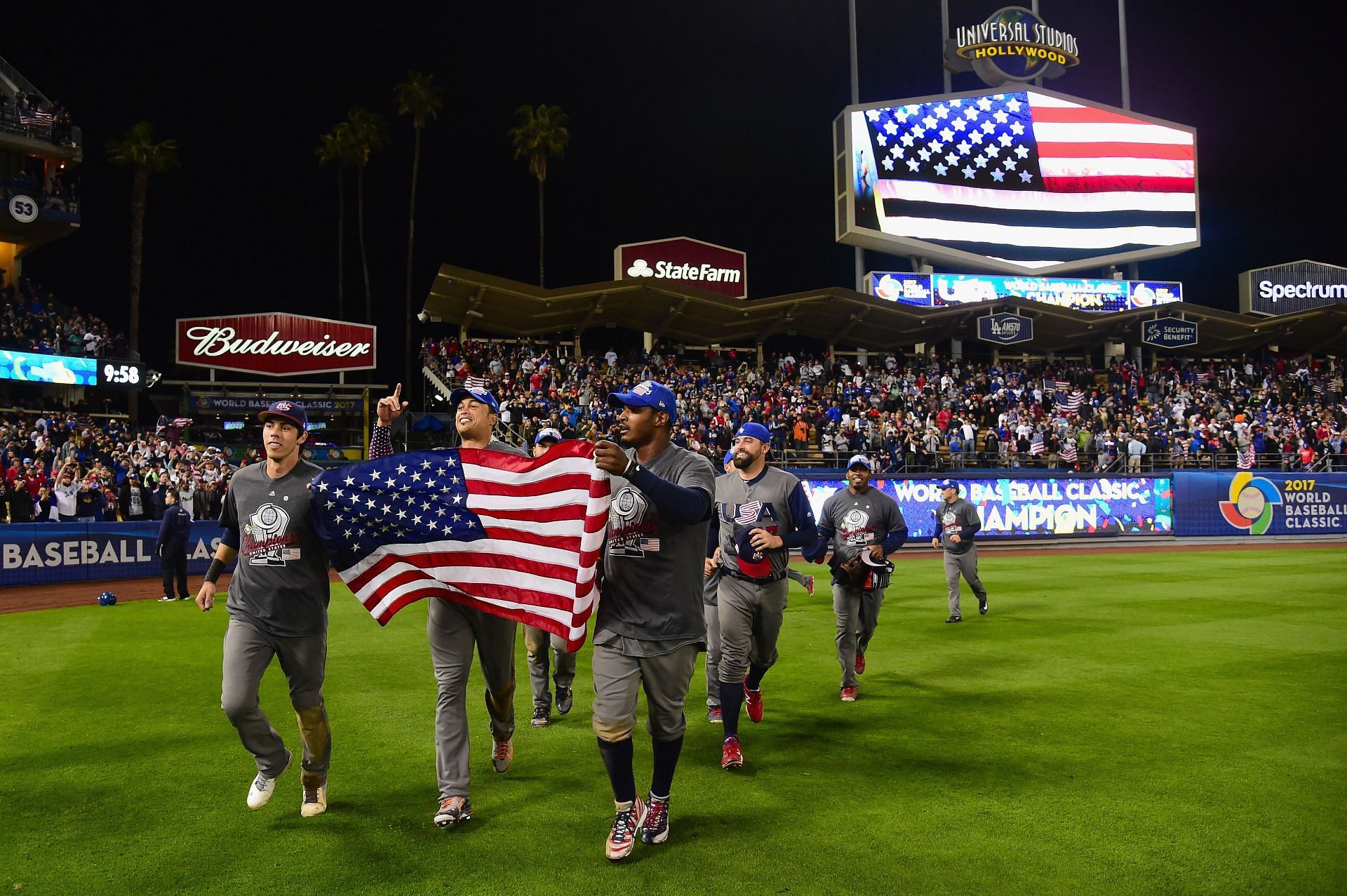 Christian Yelich Giancarlo Stanton and Adam Jones celebrate with the American Flag at the 2017 World Baseball Classic at Dodger Stadium