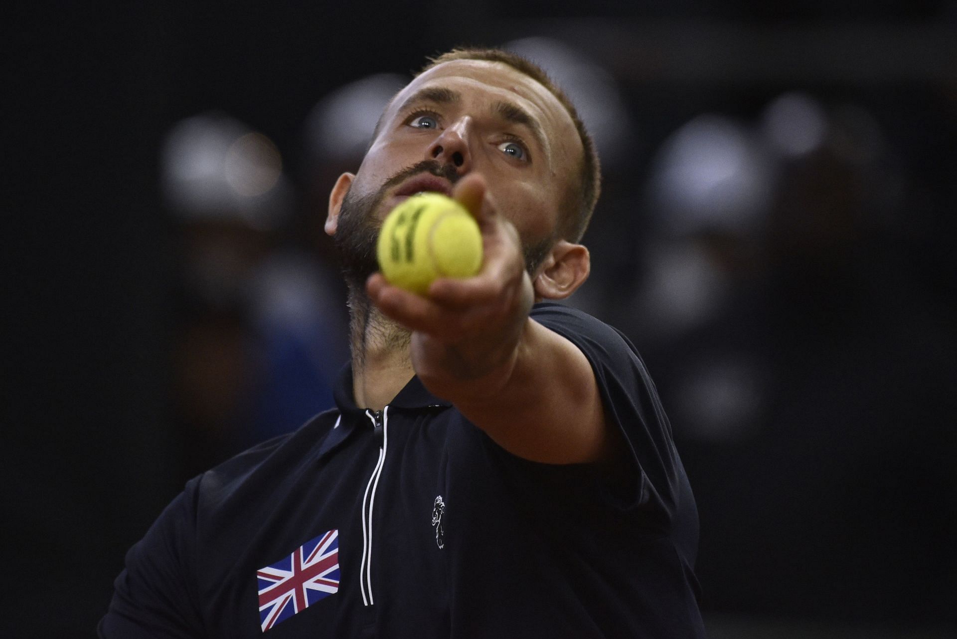 Dan Evans serves during the Colombia v Great Britain tie at the Davis Cup 2023 Round 1