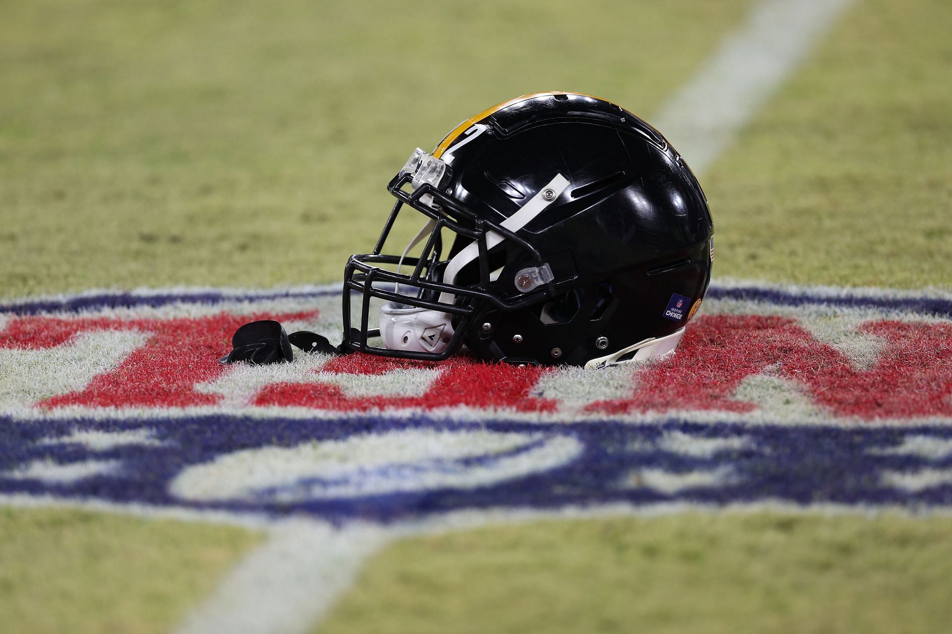 Helmet on NFL logo