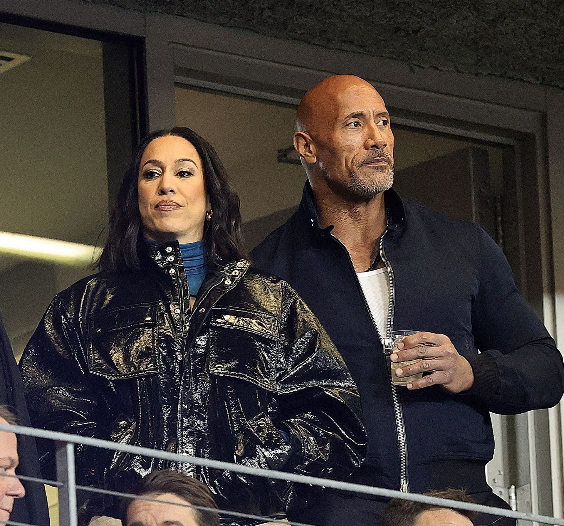 Dany Garcia and Dwayne &quot;The Rock&quot;Johnson attend the XFL game between the Orlando Guardians and Houston Roughnecks at TDECU Stadium.