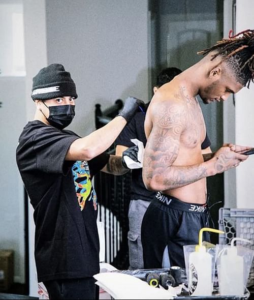 Ortega working on Lamb's tattoo. Source: Andres Ortega/TMZ