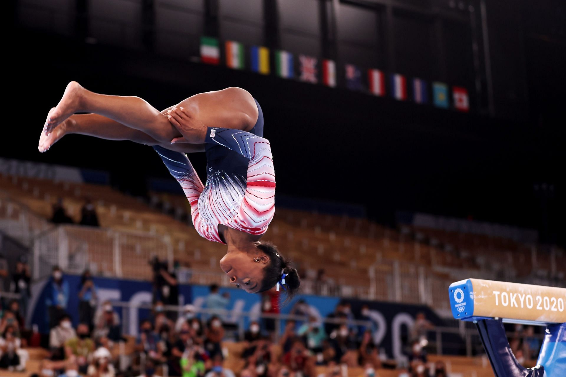 Simone Biles competes at the Tokyo 2020 Olympic Games (Photo by Jamie Squire/Getty Images)