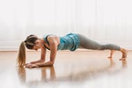 The forearm plank strengthens the core. (Photo via Pexels/Marta Wave)