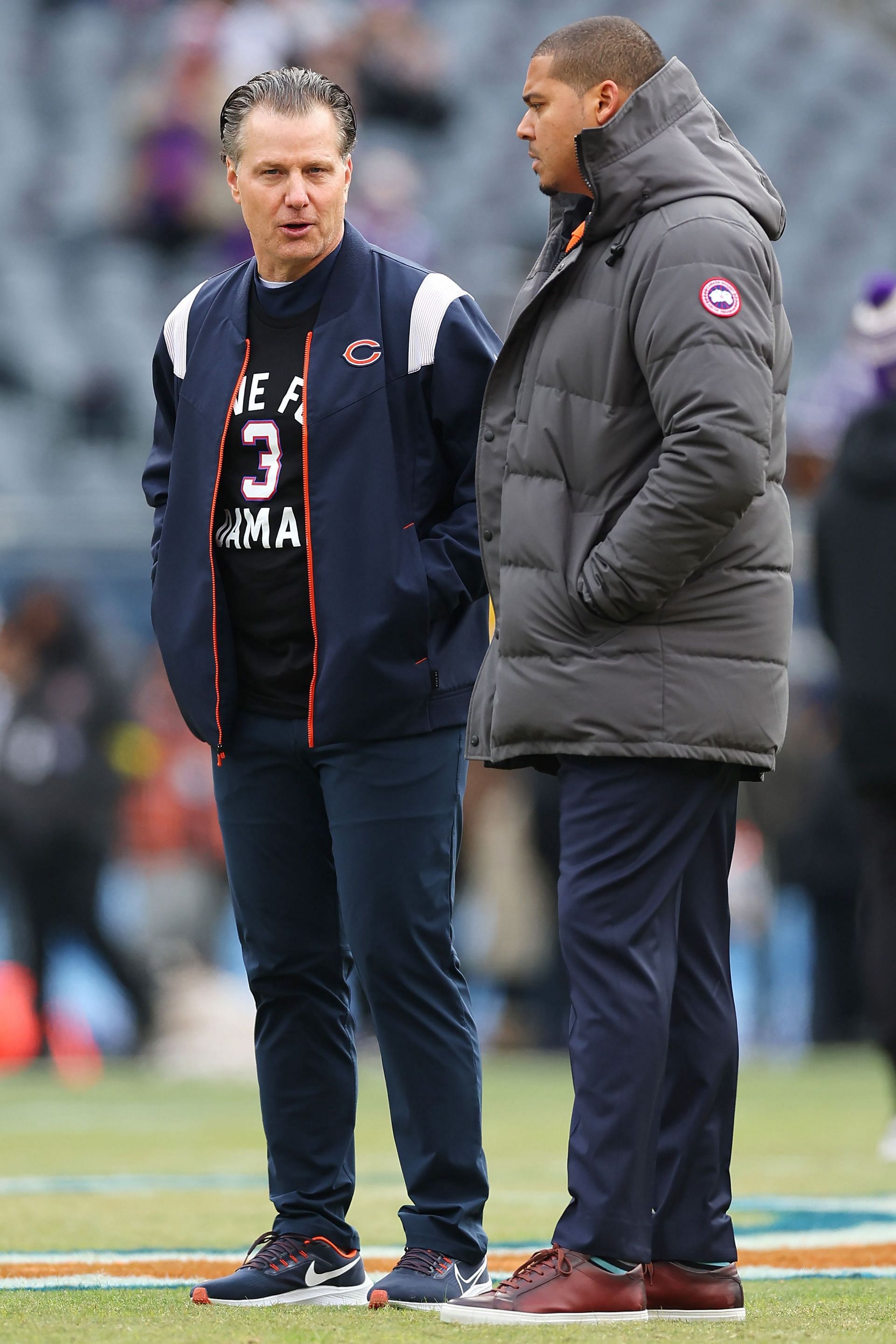Matt Eberflus and Ryan Poles at the Minnesota Vikings vs. Chicago Bears game in Week 18