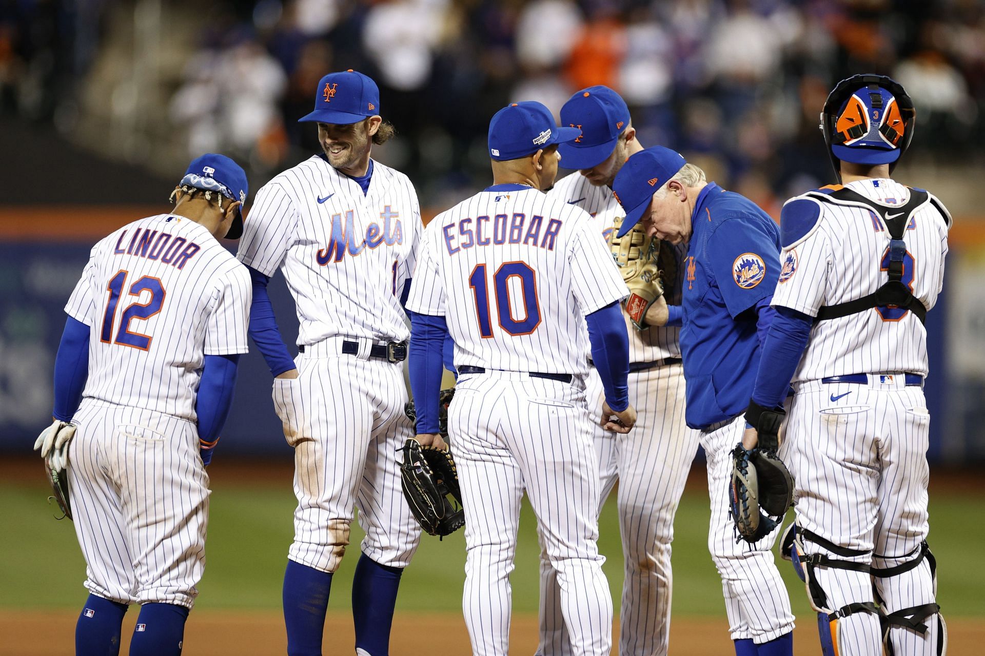 Buck Showalter visits the mound against the San Diego Padres in game two of the Wild Card Series at Citi Field