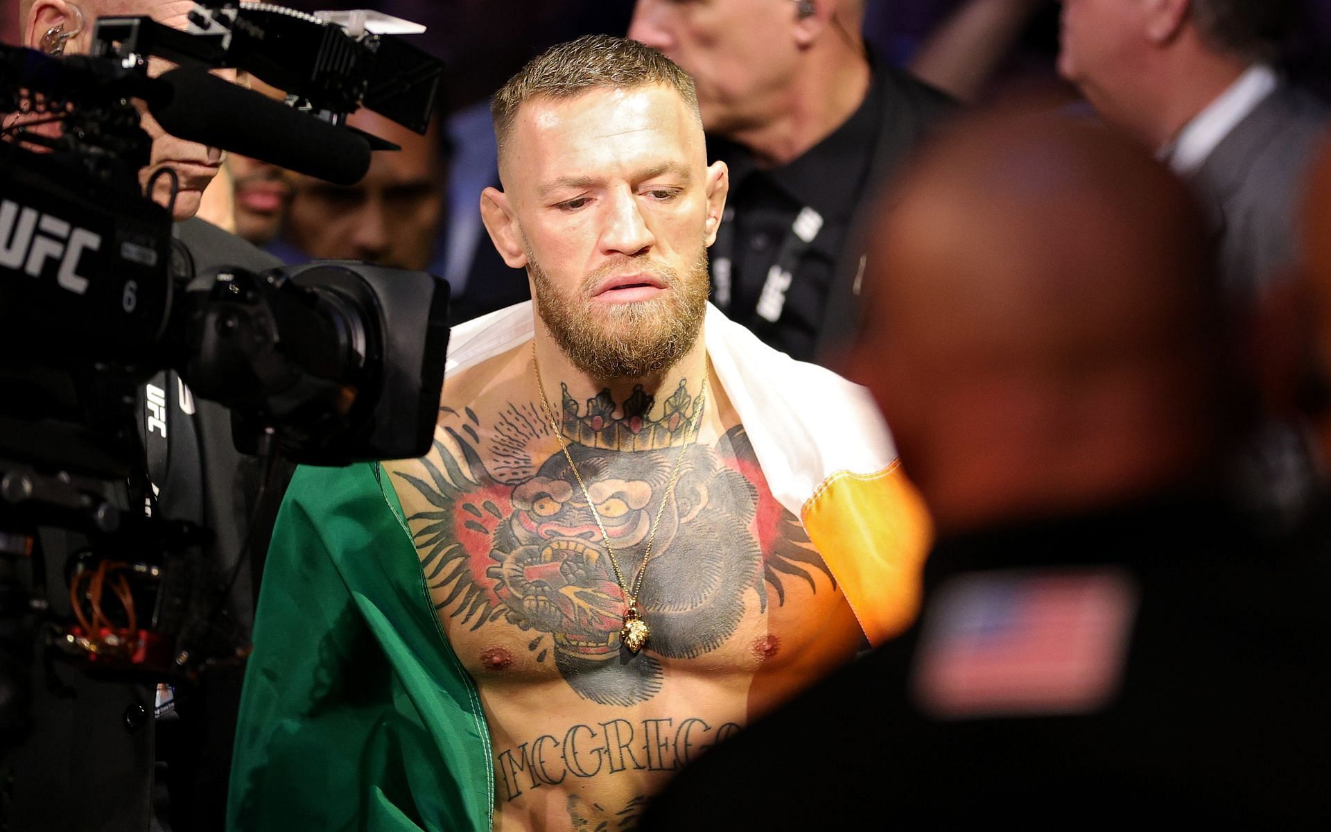 Conor McGregor walks out towards the octagon for his fight at UFC 264