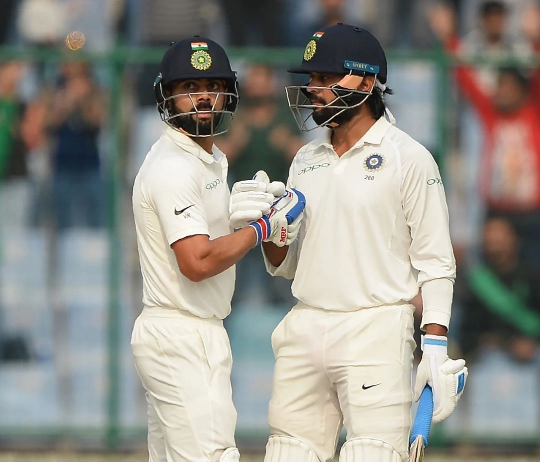 Murali Vijay and Virat Kohli celebrating their 200-run partnership vs Sri Lanka [Pic Credit: BCCI]