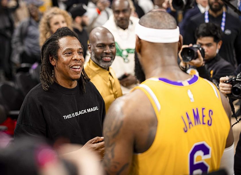 LeBron James of the Los Angeles Lakers talks with Jay-Z after