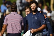 Max Homa shakes hands with Jon Rahm at the 2023 Genesis Invitational - Round Three