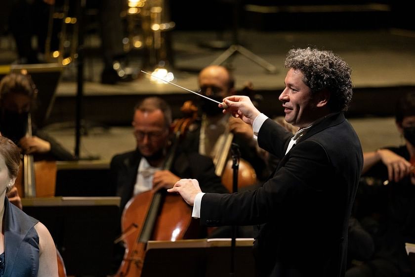 The Venezuelan conductor Gustavo Dudamel (R), his wife, the