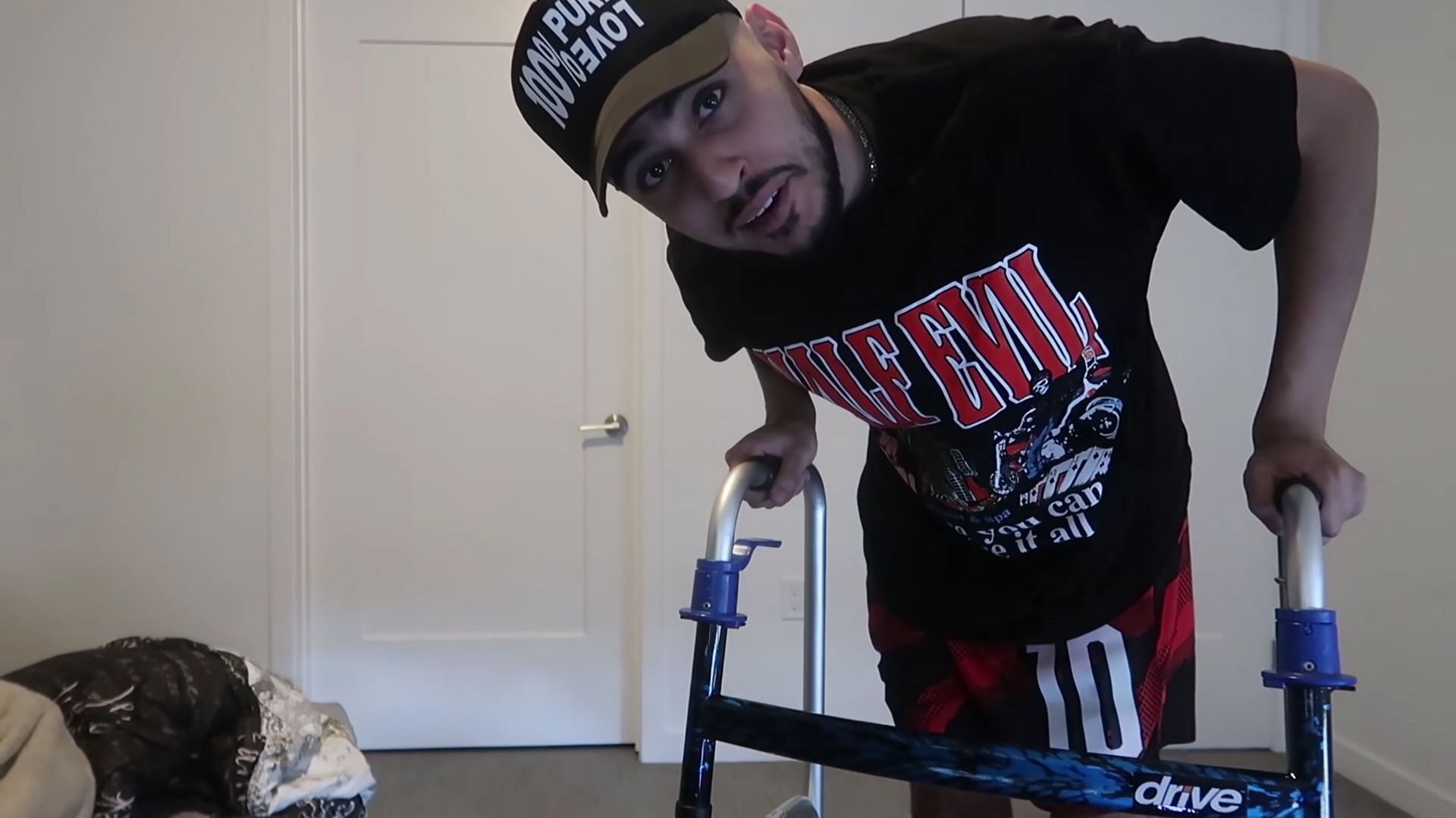 Rain could not walk unassisted for two years (image via YouTuve/@FaZe Rain)