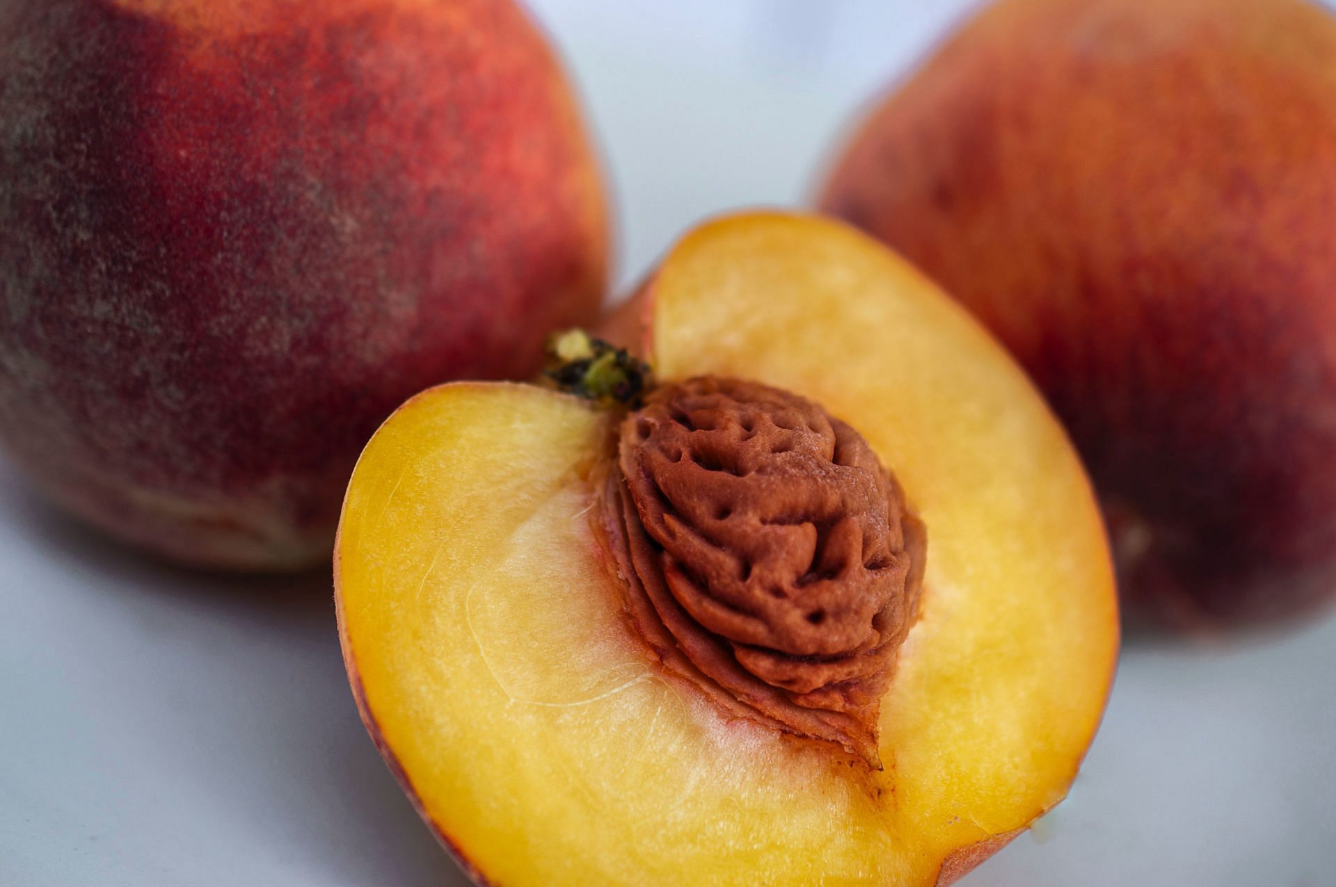 There is about 68 calories in a peach. (Image via Unsplash / Sara Cervera)