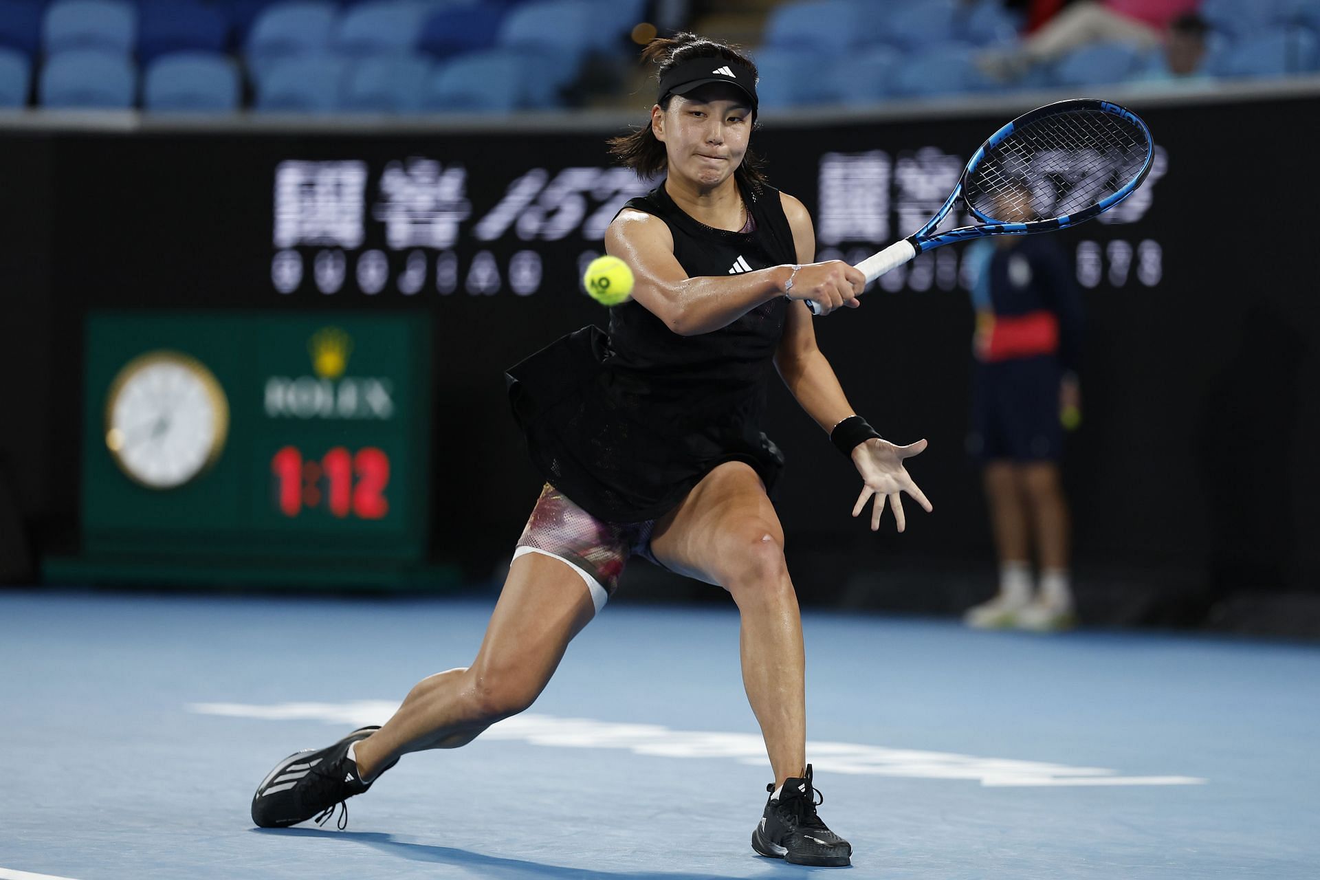 Wang Xinyu pictured at the 2023 Australian Open - Day 3. Enter caption