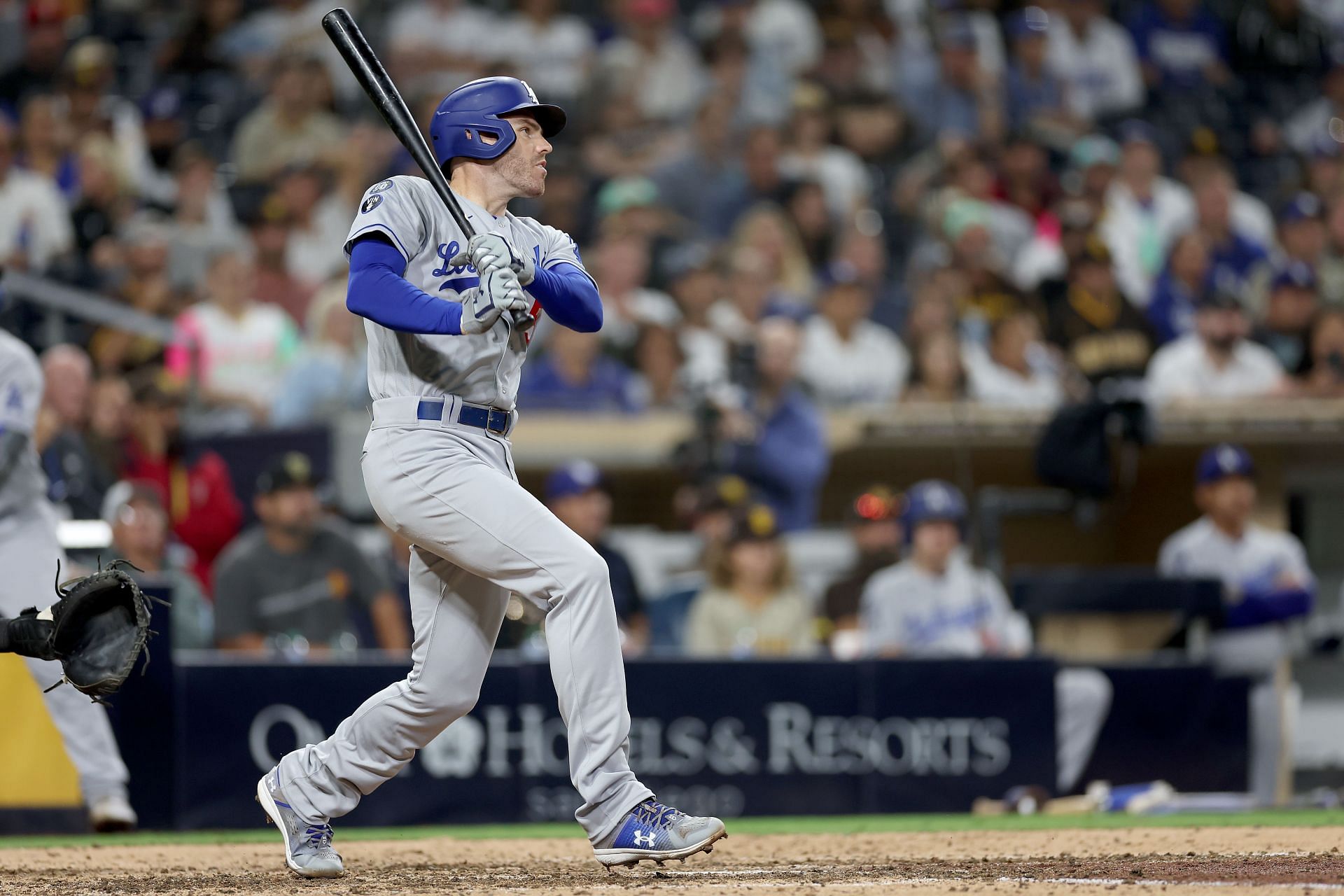 Freddie Freeman of the Los Angeles Dodgers connects for an RBI single during a game at PETCO Park