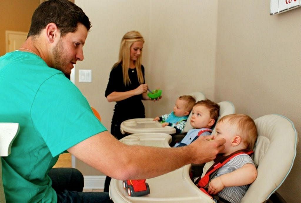 Dan Orlovsly with his wife and triplets