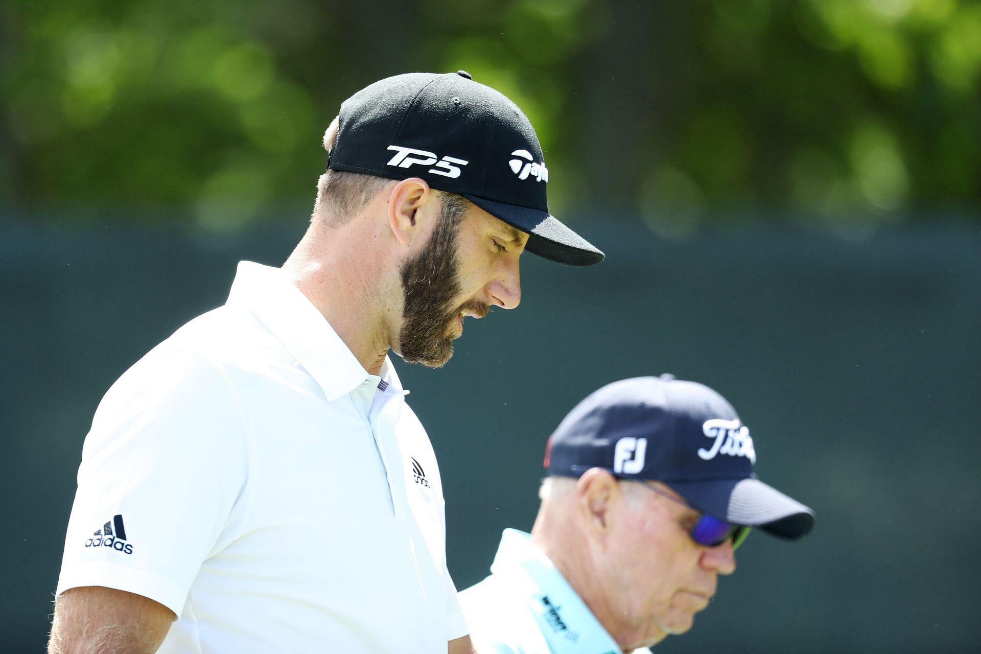 Butch Harmon with Dustin Johnson, now of LIV Golf