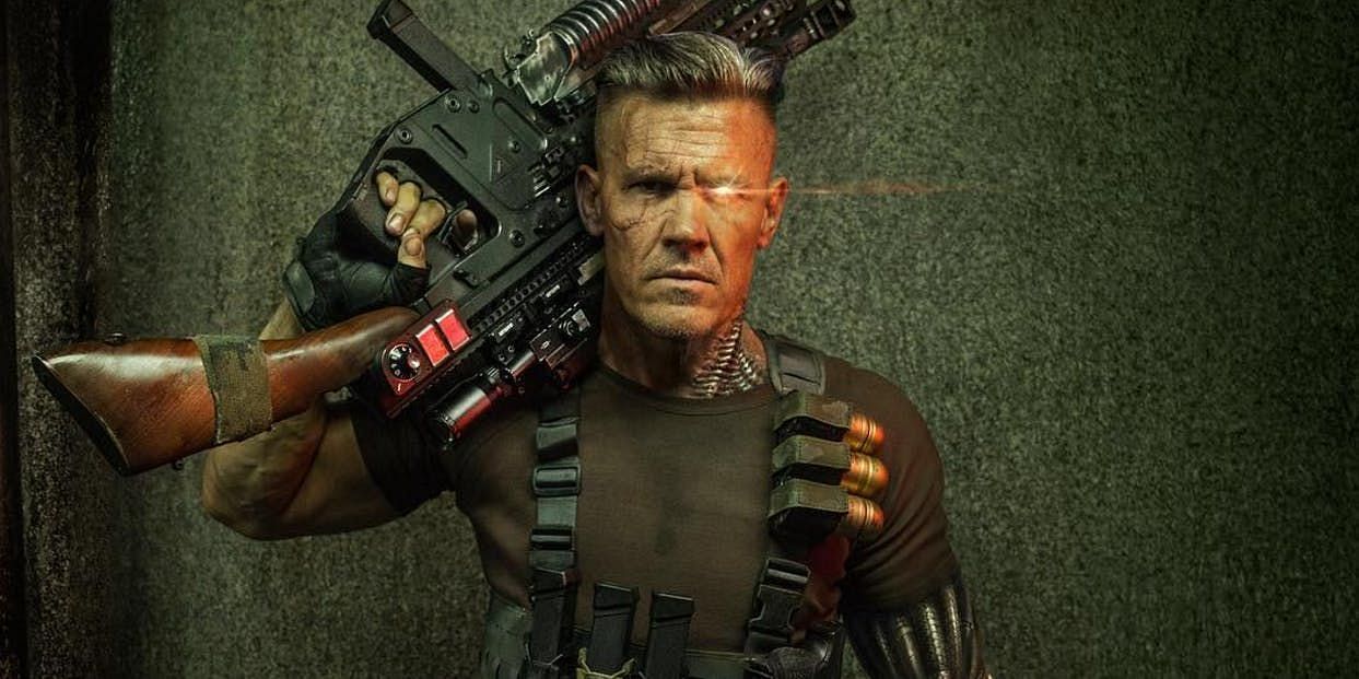 Nathan Summers, better known as Cable, stands ready for battle with his futuristic weapons and tech (Image via 20th Century Studios)