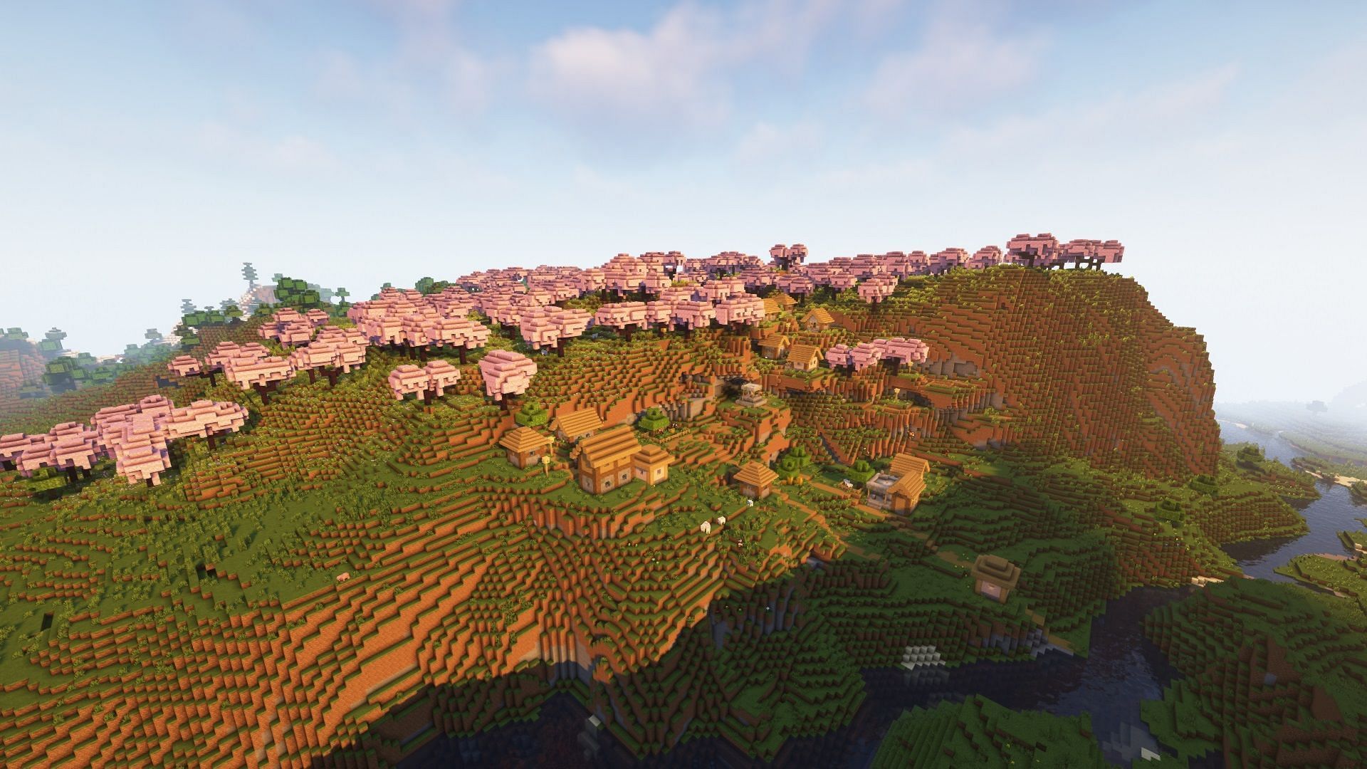 A village next to cherry groves (Image via Mojang)