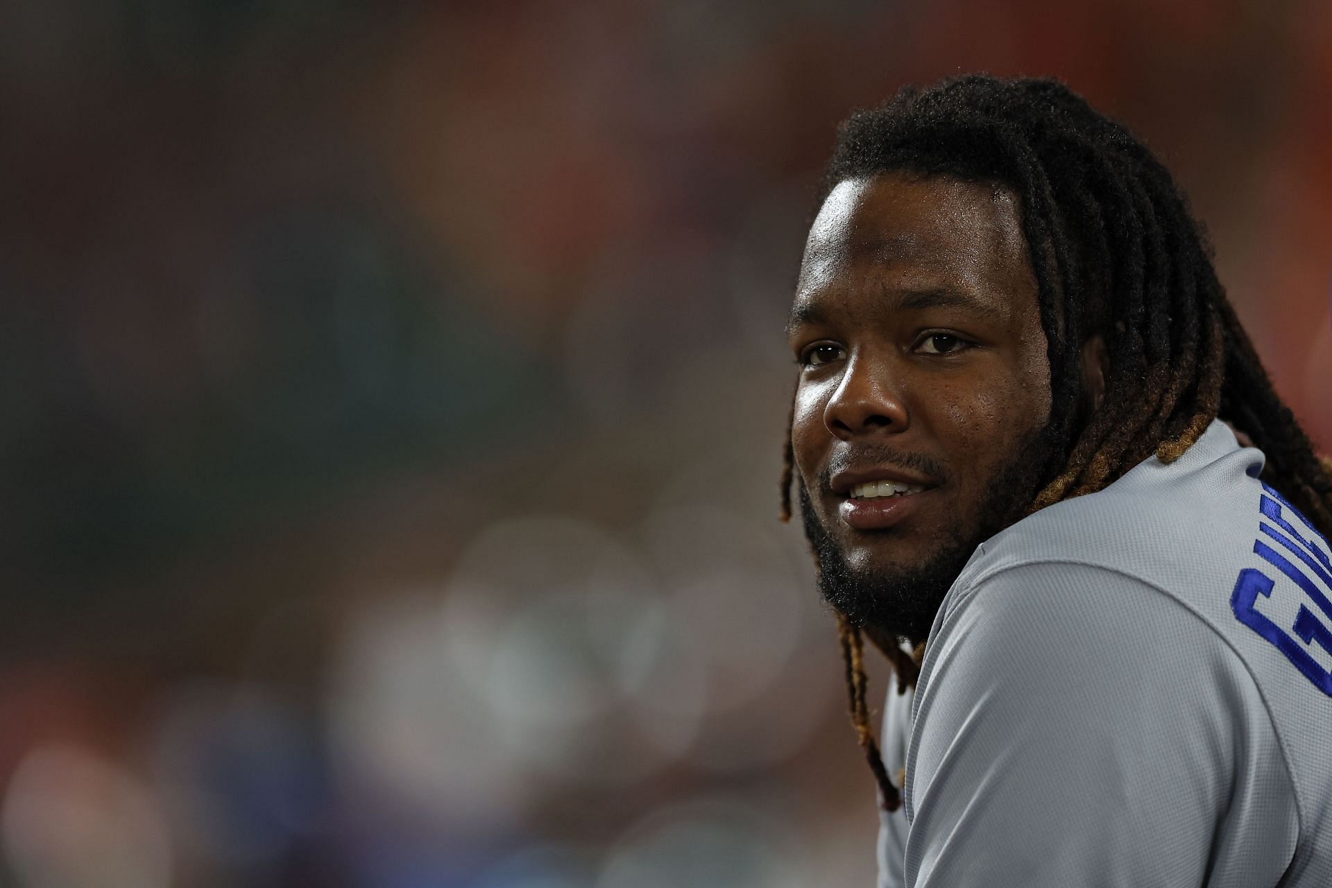 Vladimir Guerrero Jr. of the Toronto Blue Jays looks on from the dugout.