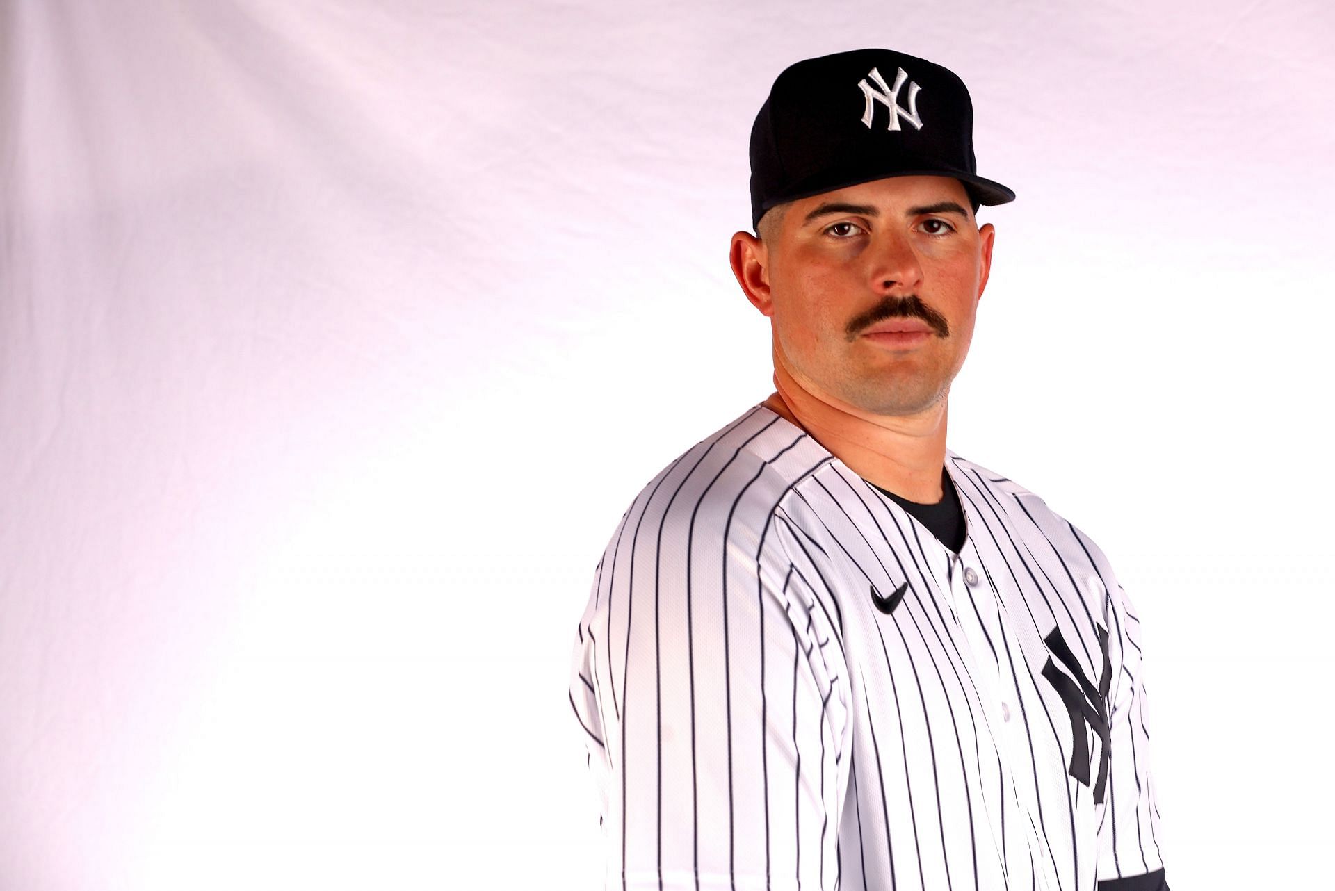 Carlos Rodon #55 of the New York Yankees poses for a portrait during media day