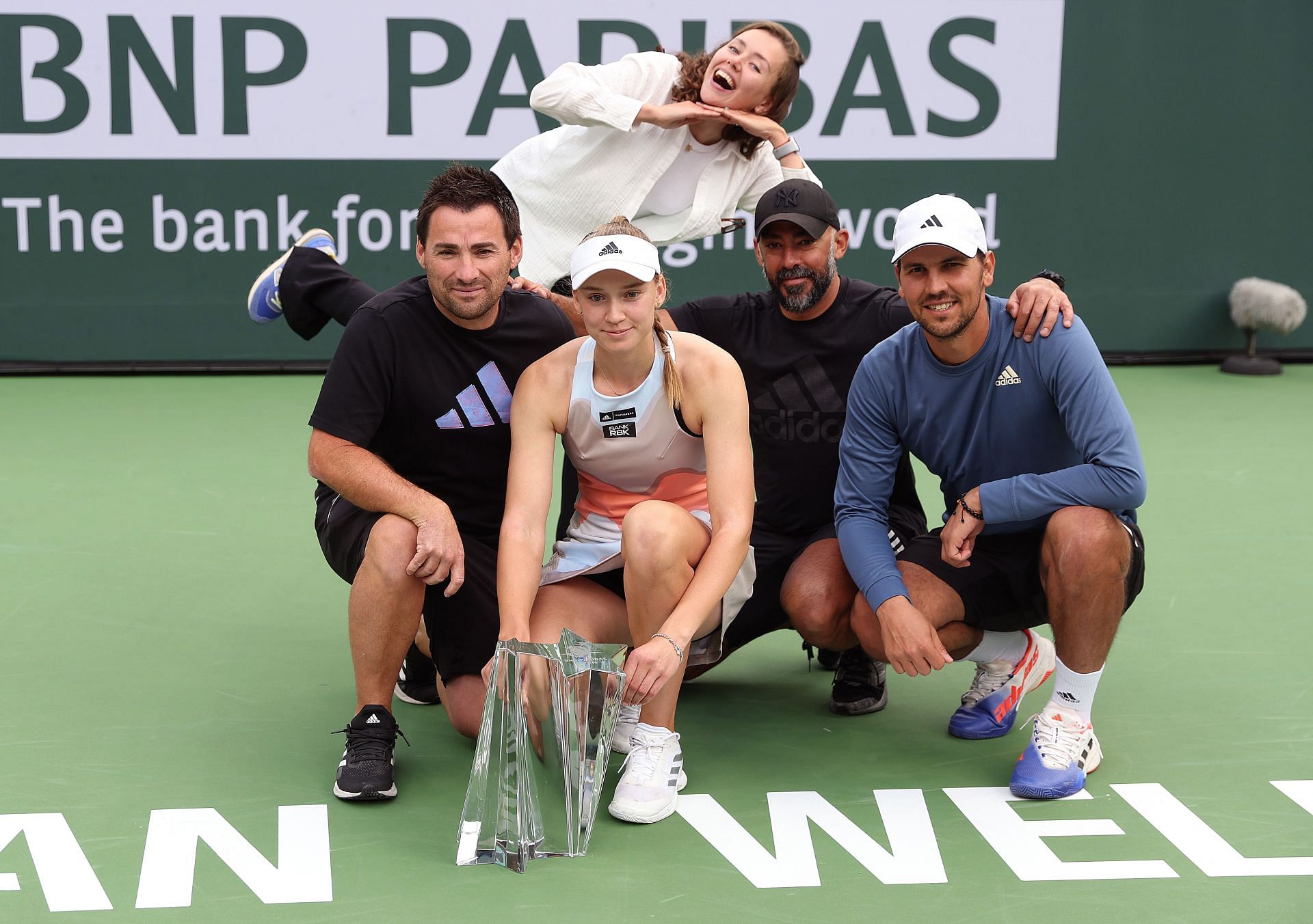 Rybakina poses with her team including elder sister Anna