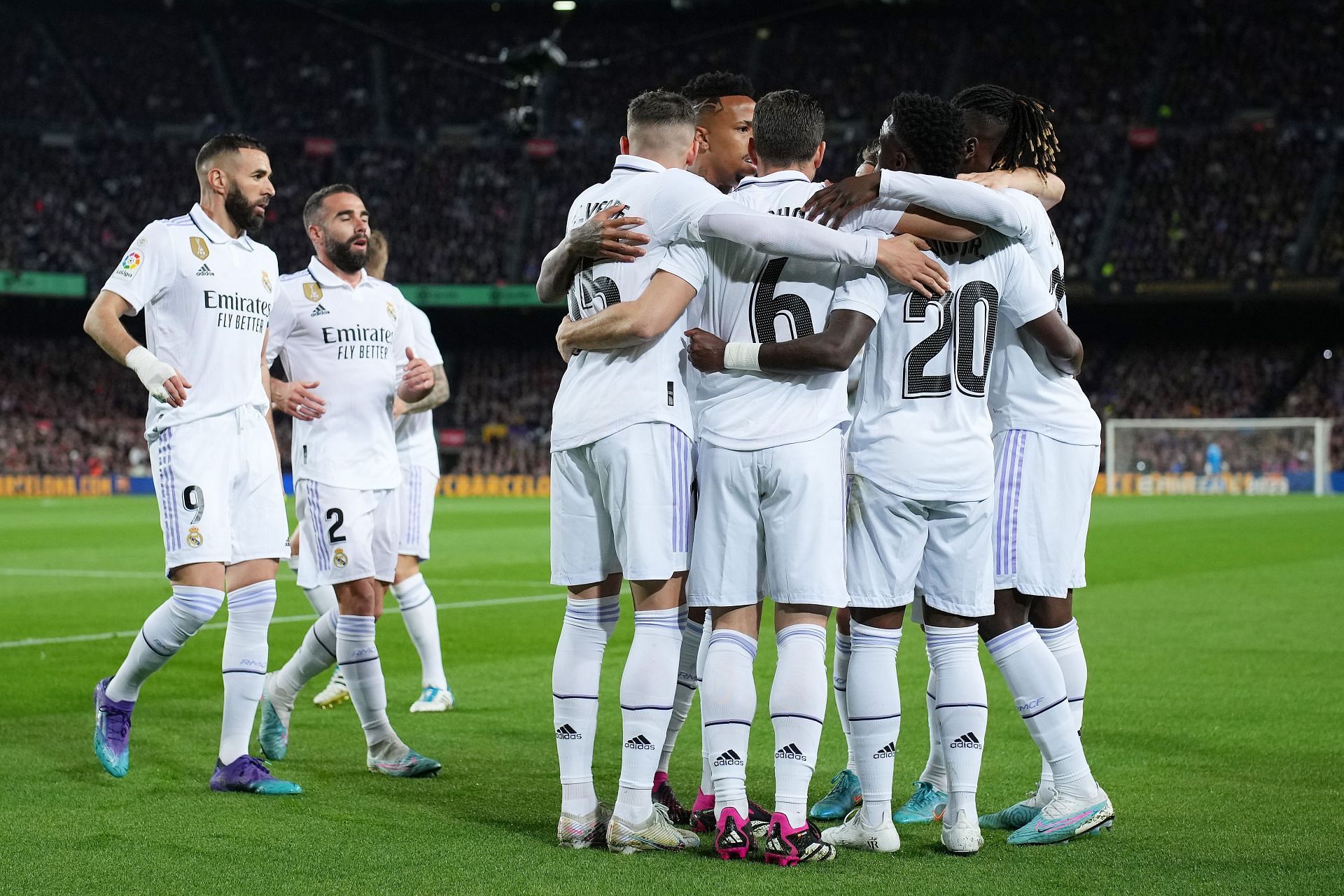 Madrid players celebrate a goal.