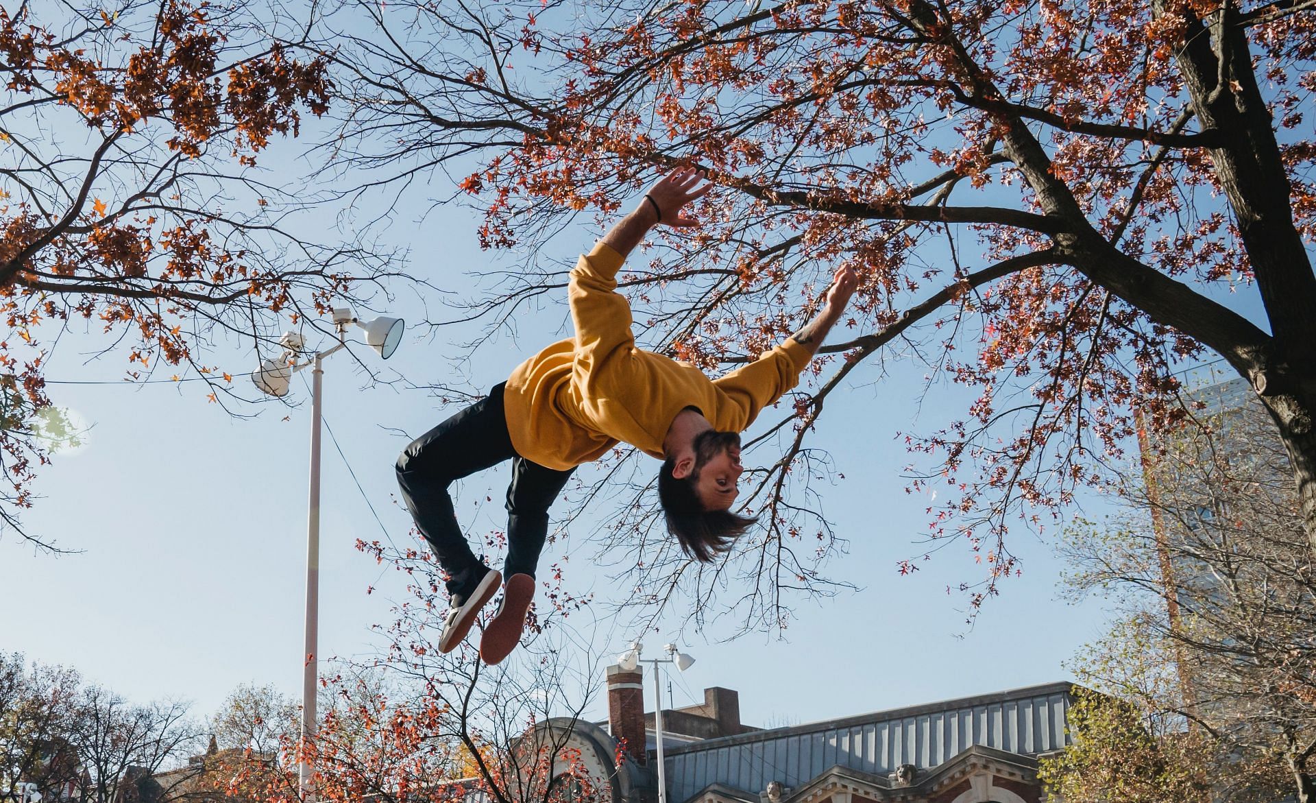 This workout is a creative combination of gymnastics and parkour (Image via Pexels @Mary Taylor)