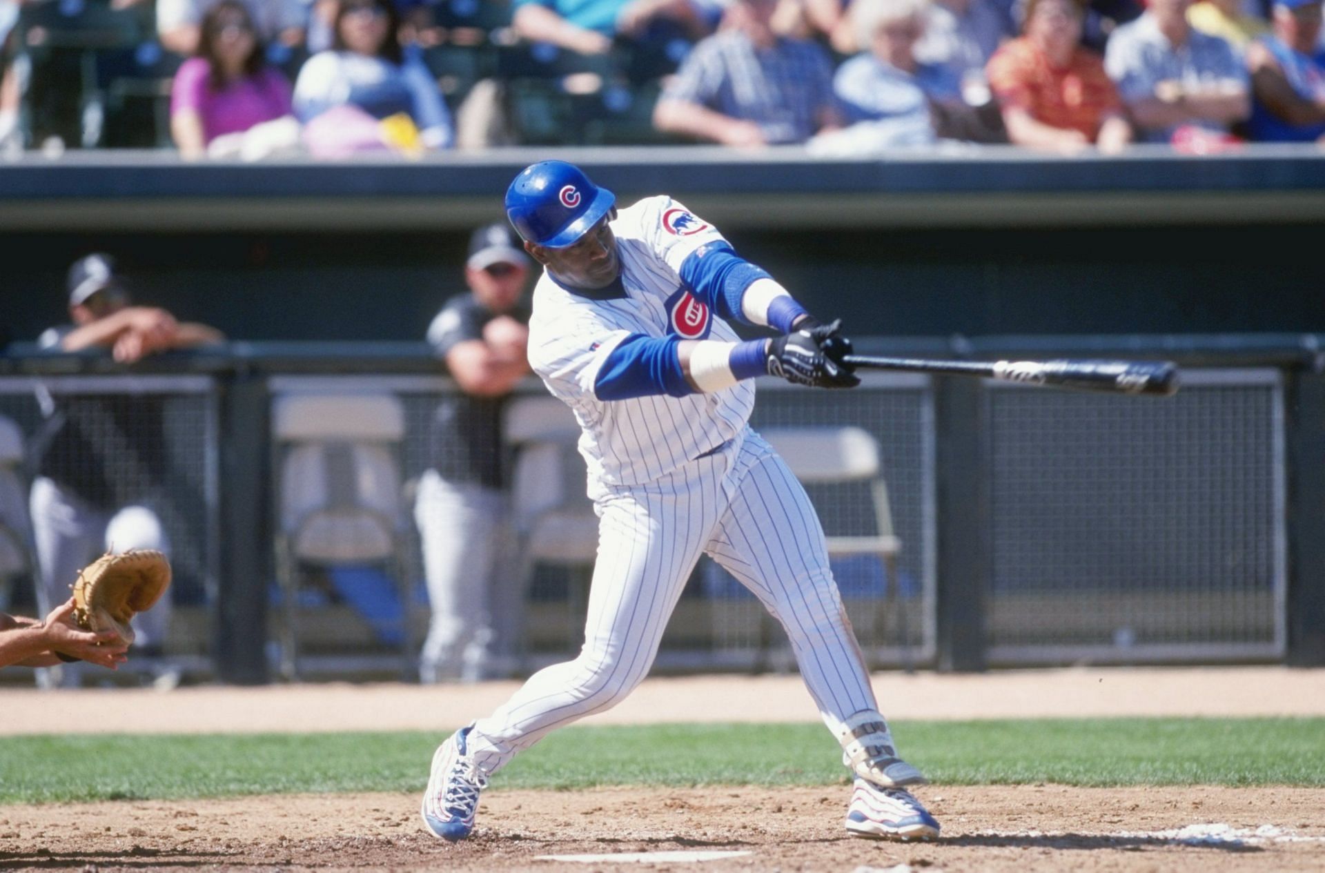 Sammy Sosa: 9 Mar 1999: Outfielder Sammy of the Chicago Cubs swings at the ball during the Spring Training game against the Chicago White Sox at the HoHoKam Park in Mesa, Arizona. The Cubs defeated the White Sox 13-2. Mandatory Credit: Stephen Dunn /Allsport