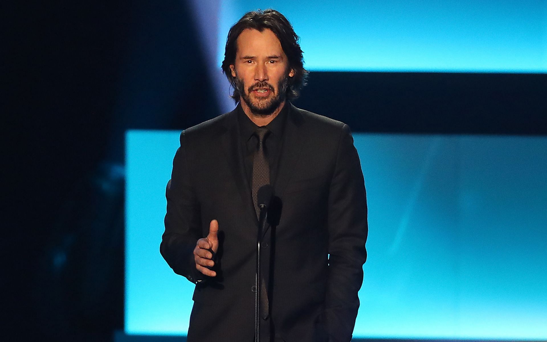 Keanu Reeves speaking at NHL 100