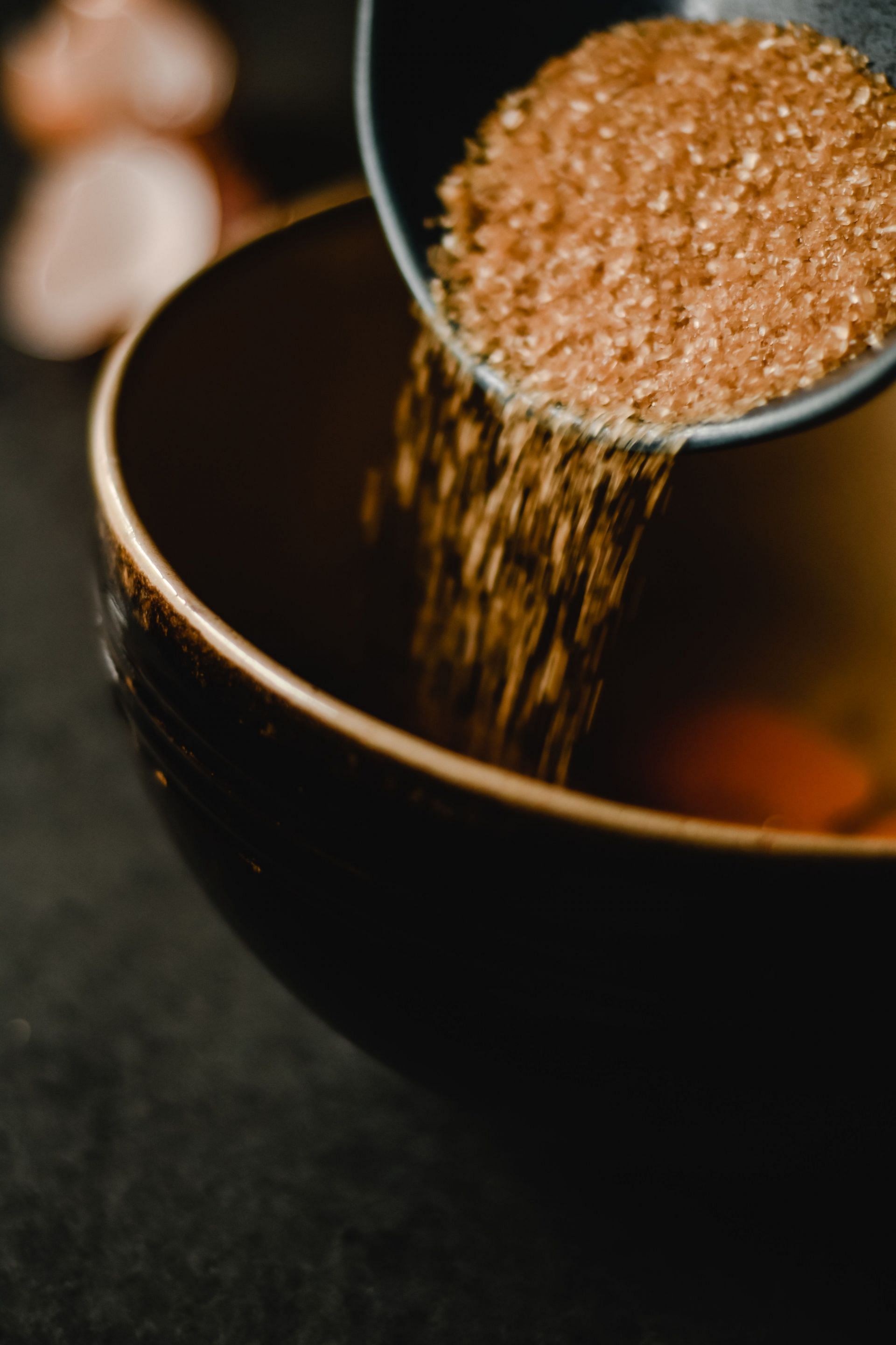 Brown sugar is produced by mixing white sugar with molasses (image via Pexels)  