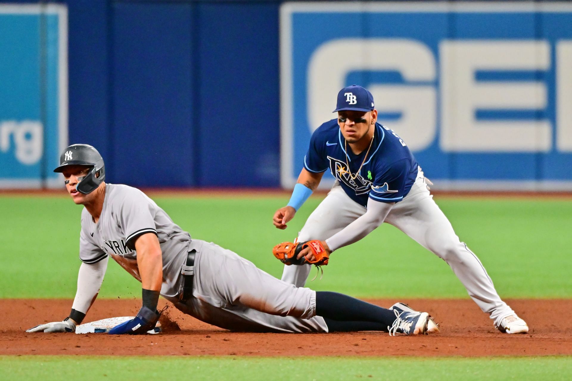 Aaron Judge steals second base against Isaac Paredes of the Tampa Bay Rays at Tropicana Field