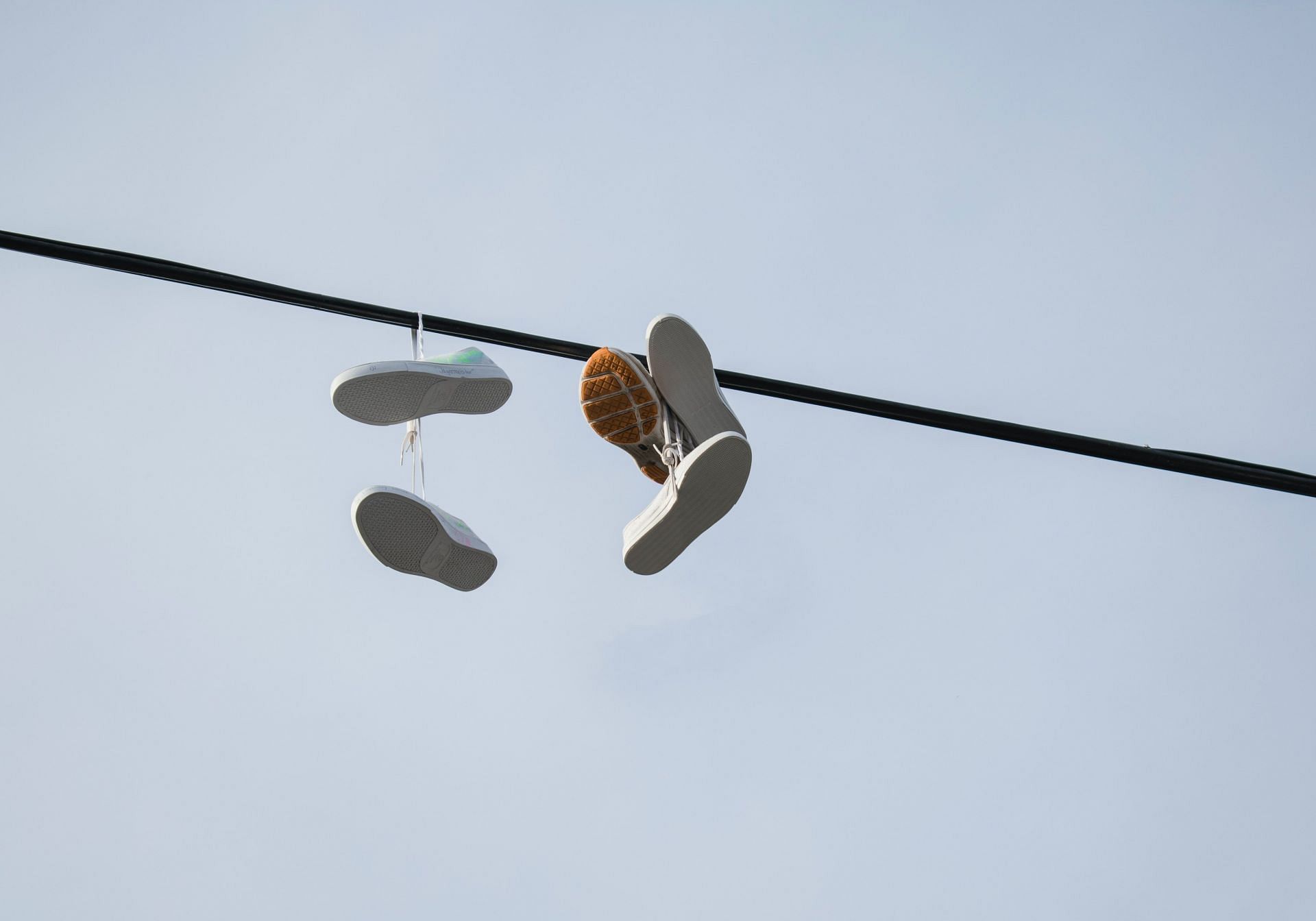 Hanging shoes does not mean gangster area (Image via Pexel)