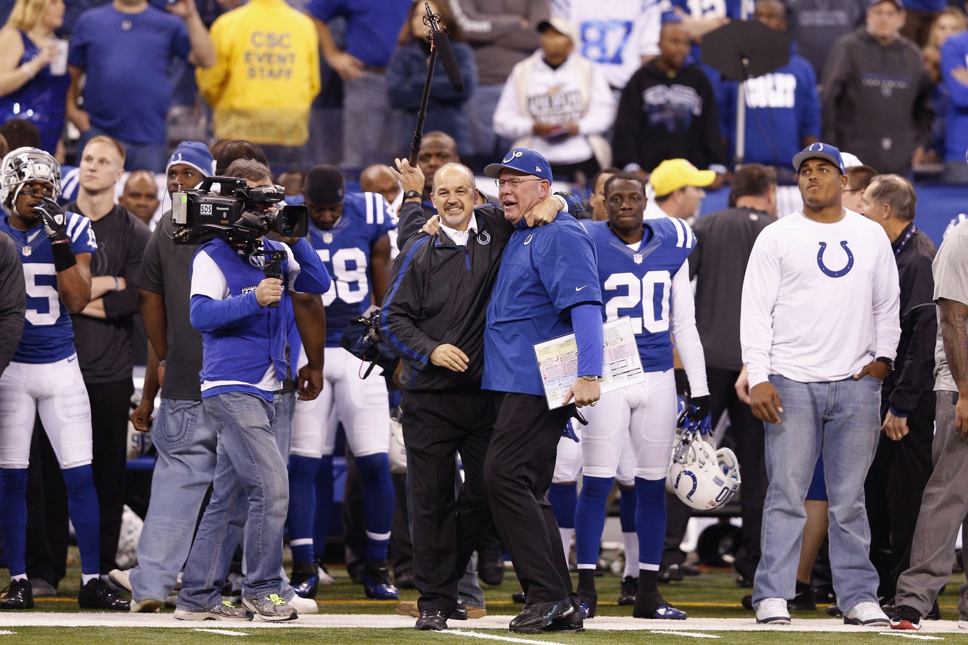 Head coach Chuck Pagano of the Indianapolis Colts hugs offensive coordinator Bruce Arians