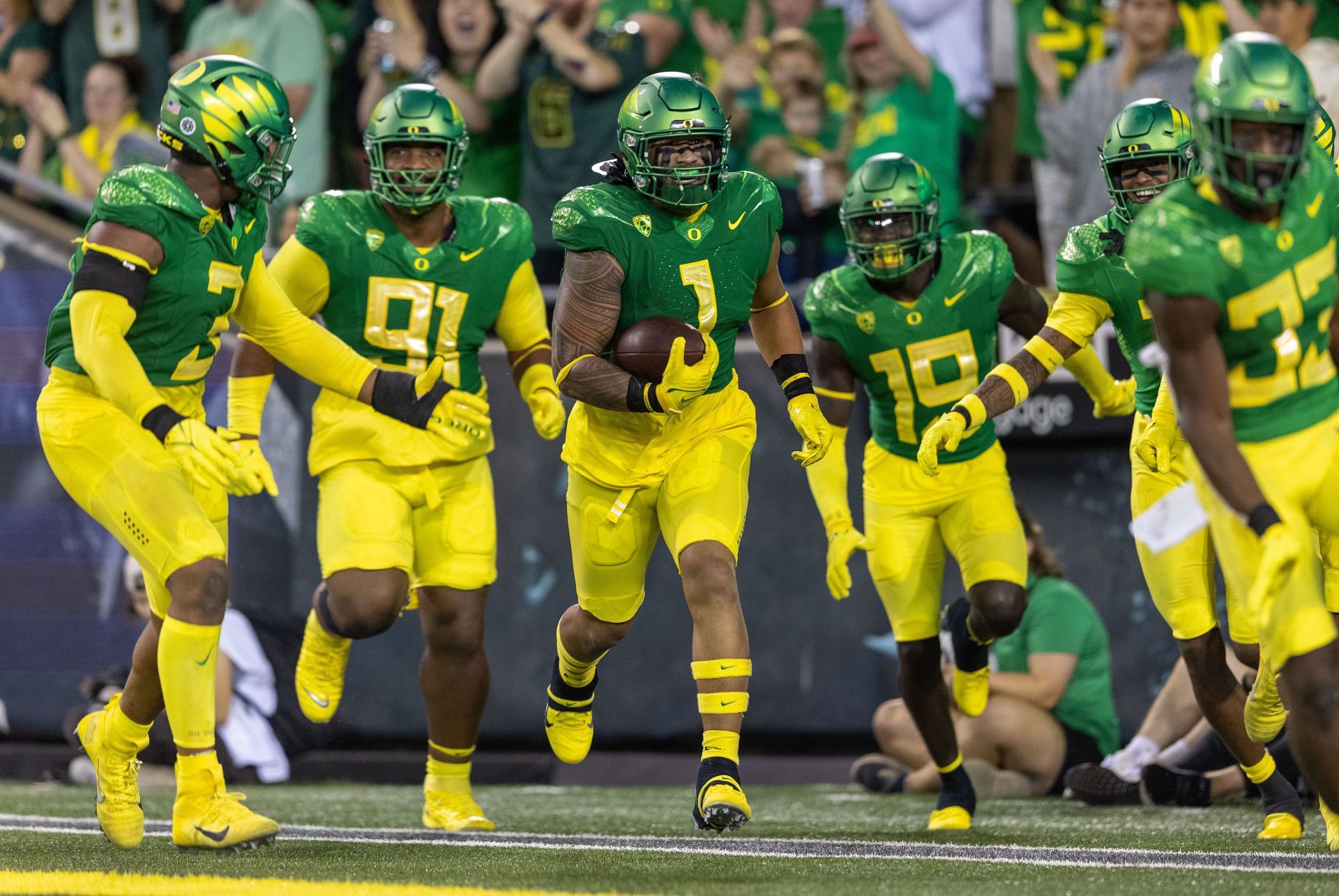 Noah Sewell #1 of the Oregon Ducks celebrates his fumble recovery against the Stanford Cardinal