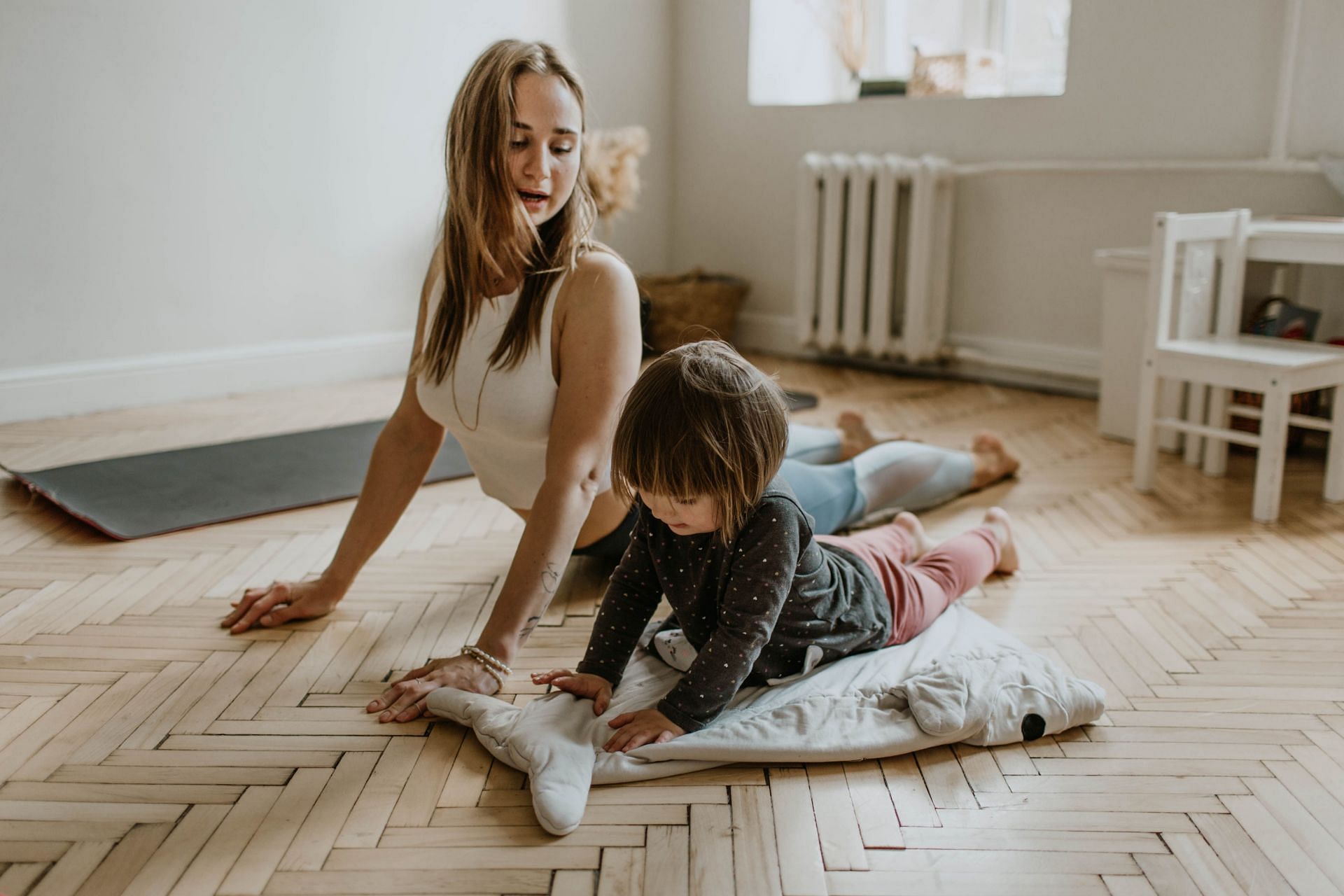 Child pose yoga is relaxing and calming. (Image via Pexels/ Valeria Ushakova)