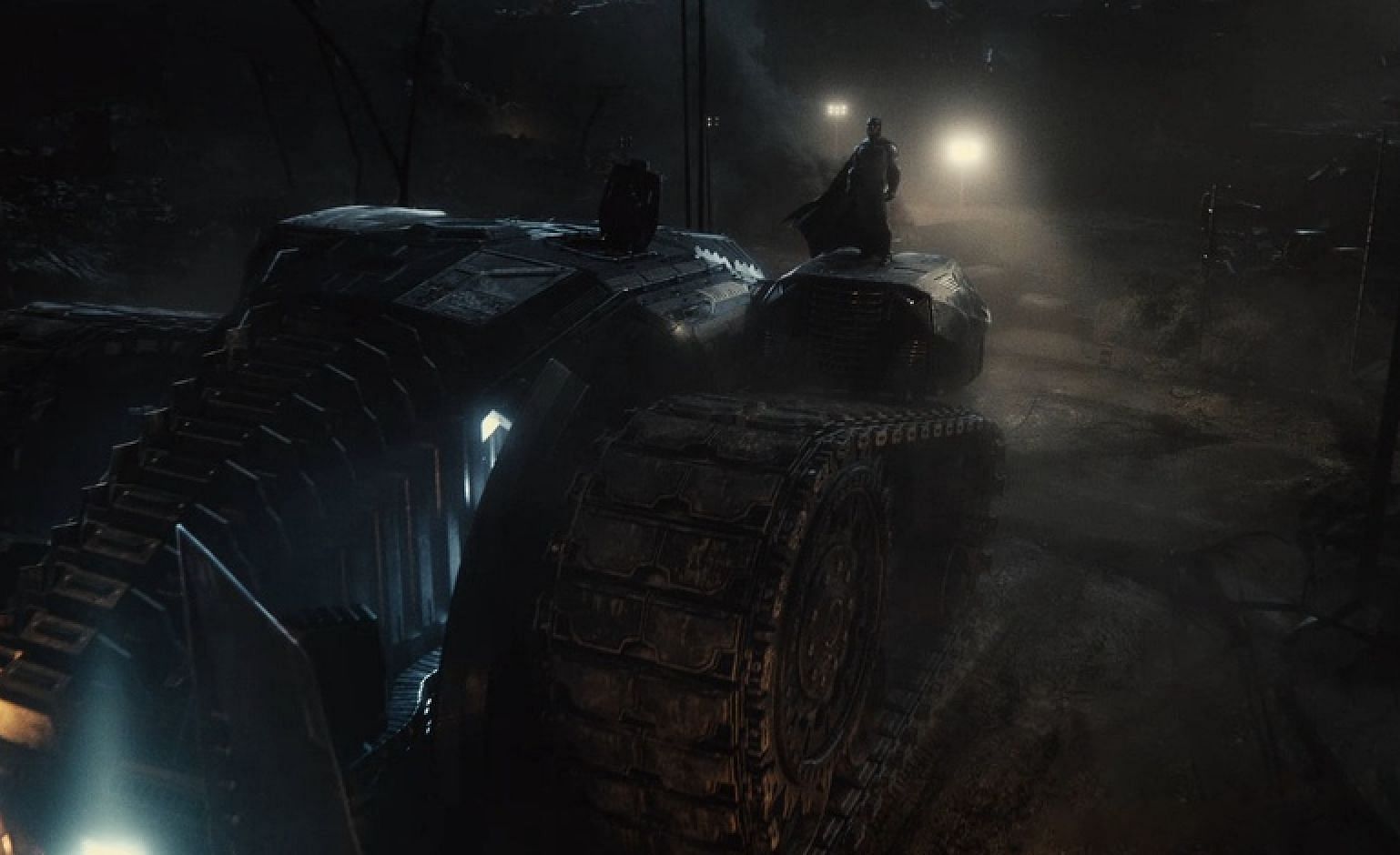 A heavily armored and weaponized version of the Batmobile, used to confront heavily armed criminals and villains (Image via Warner Bros)