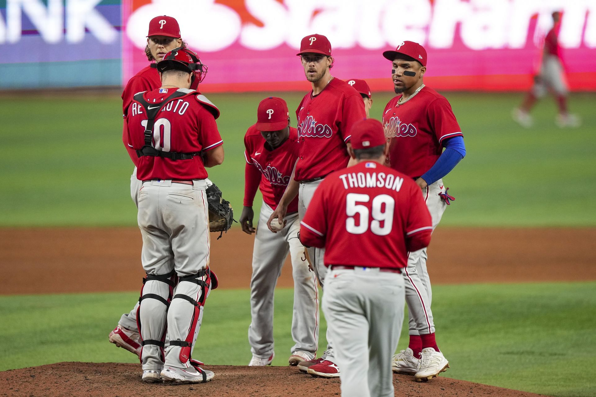 Rob Thomson walks towards the mound to make a pitching changeagainst the Miami Marlins at loanDepot park