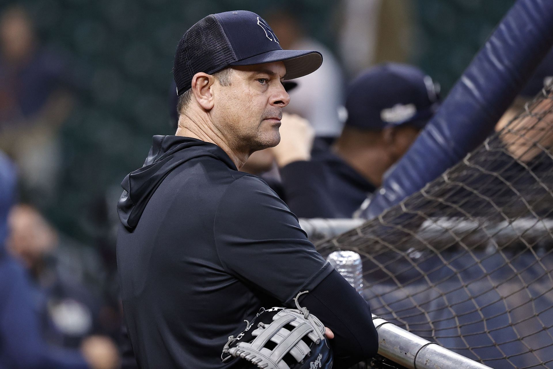Aaron Boone watches his team warm up before the game against the Houston Astros at Minute Maid Park