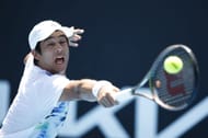 Nakashima tries to reach the ball at the 2023 Australian Open