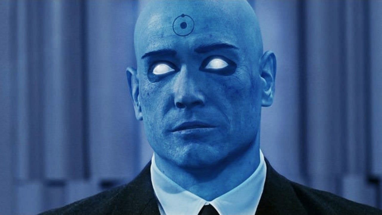 he God-like Being - Doctor Manhattan possesses god-like powers including the ability to manipulate matter at a molecular level and see the future (Image via Warner Bros)