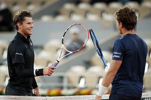 Dominic Thiem (L) and Casper Ruud